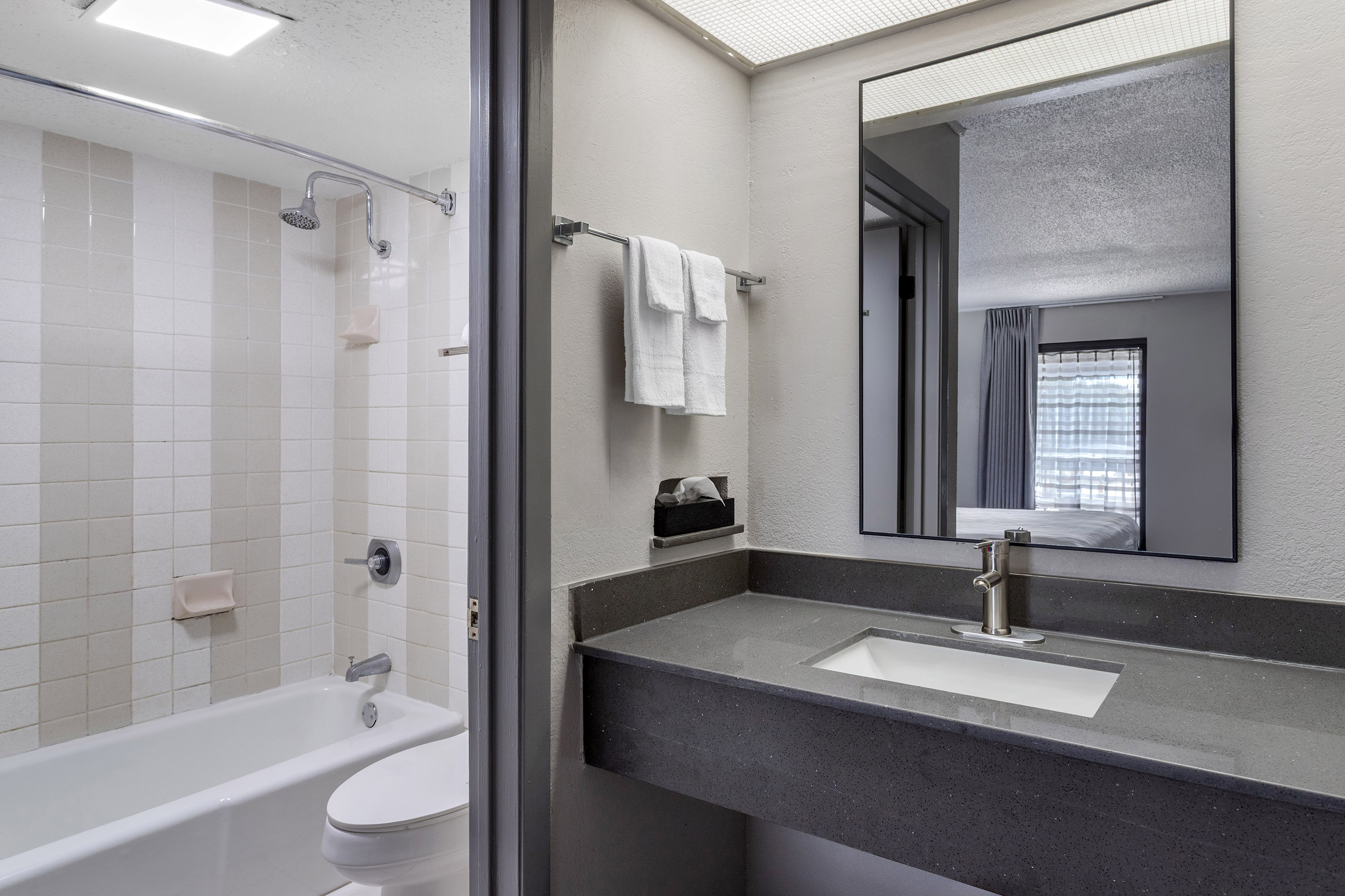 Guest room bath at the Days Inn by Wyndham Victoria TX East in Victoria, Texas