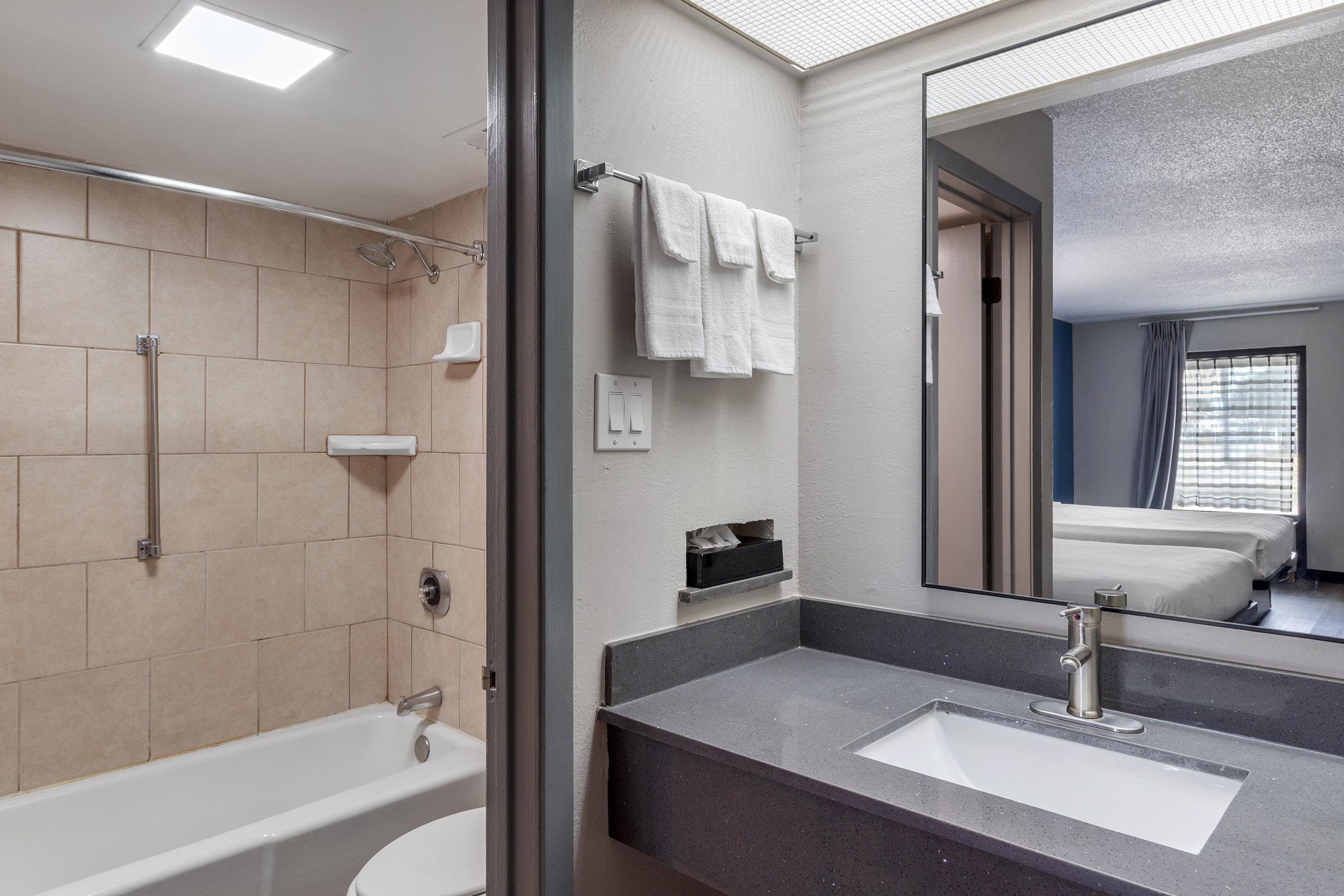 Guest room bath at the Days Inn by Wyndham Victoria TX East in Victoria, Texas
