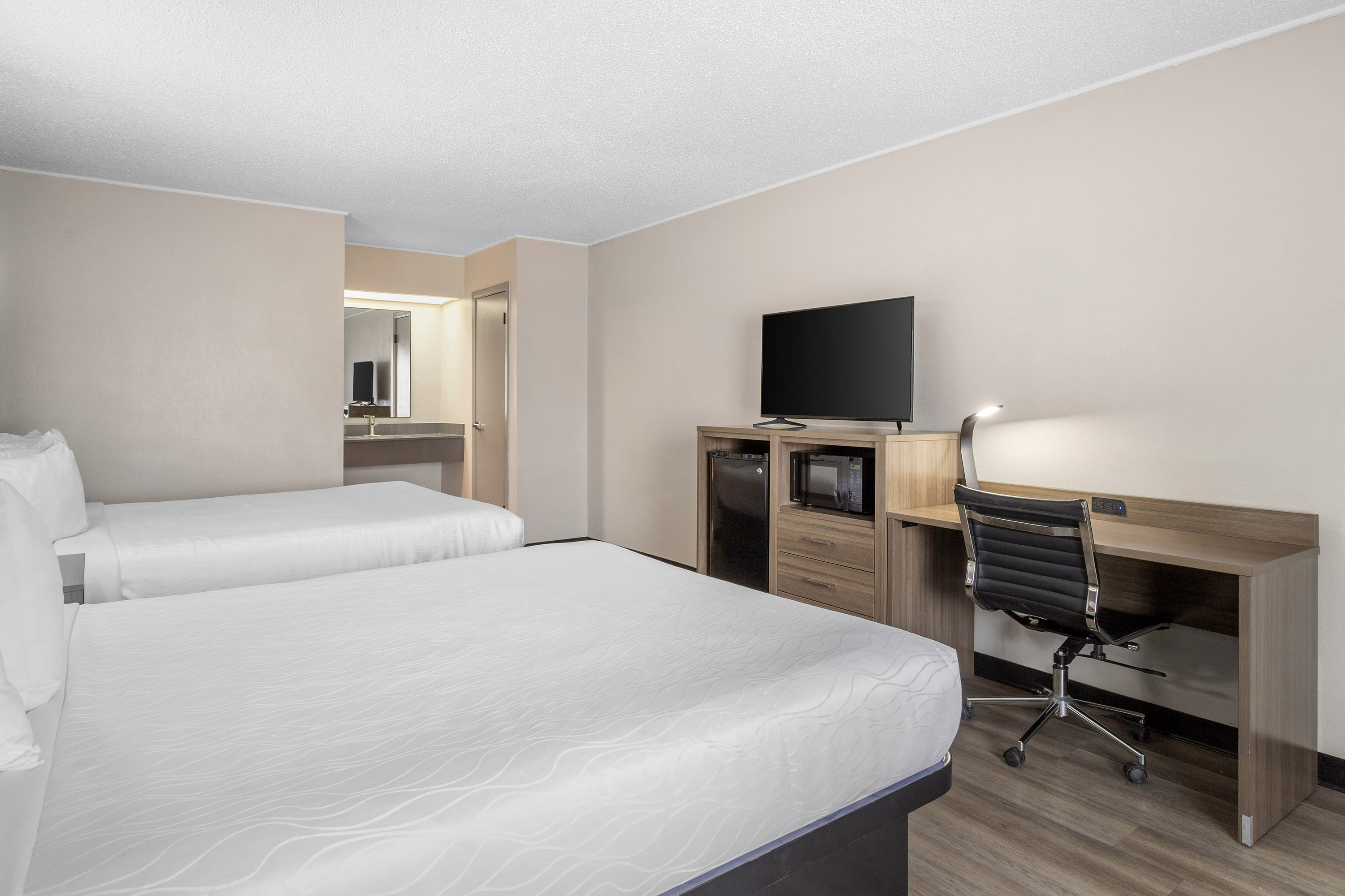 Guest room at the Days Inn by Wyndham Victoria TX East in Victoria, Texas