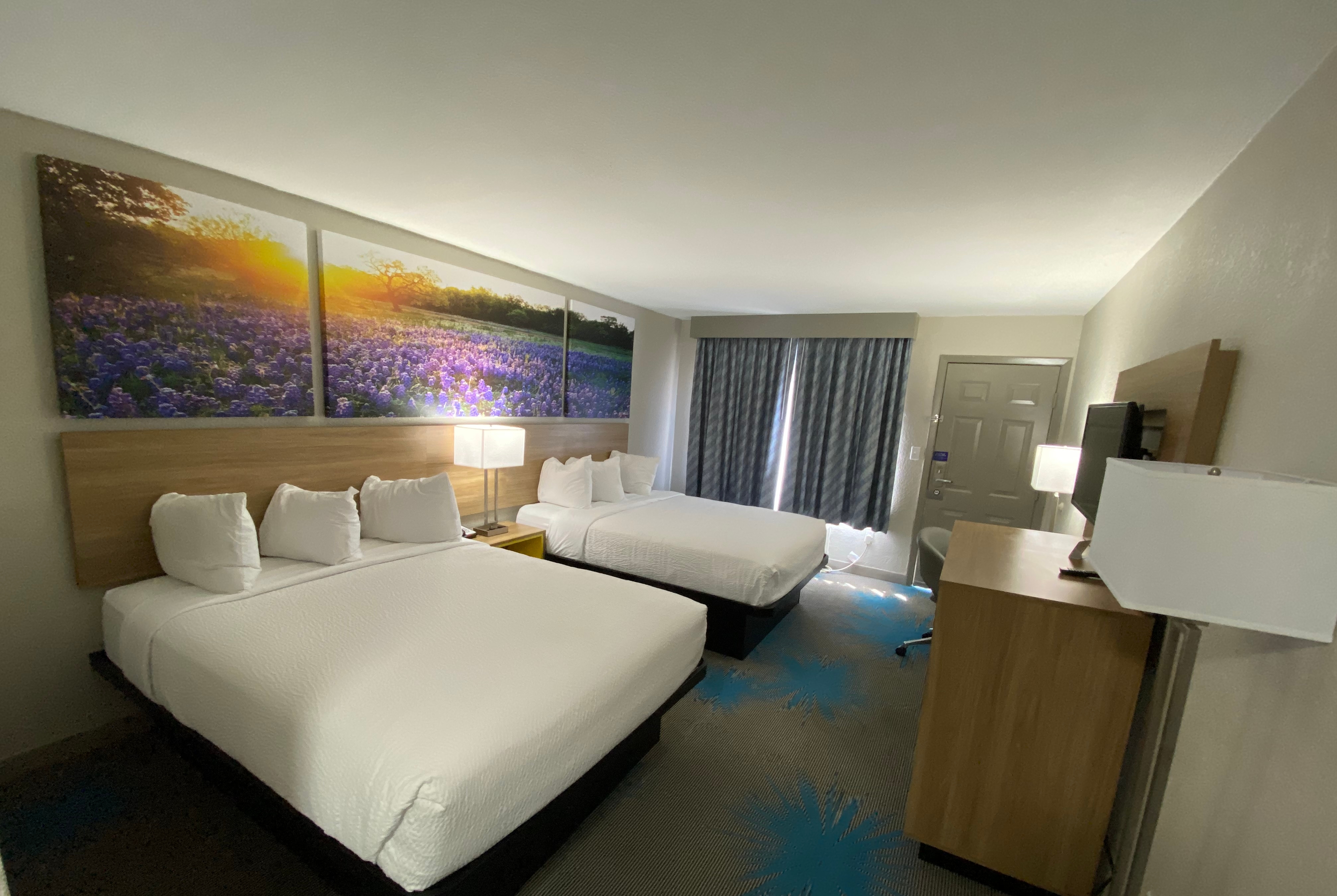 Guest room at the Days Inn by Wyndham Waco University Area in Waco, Texas