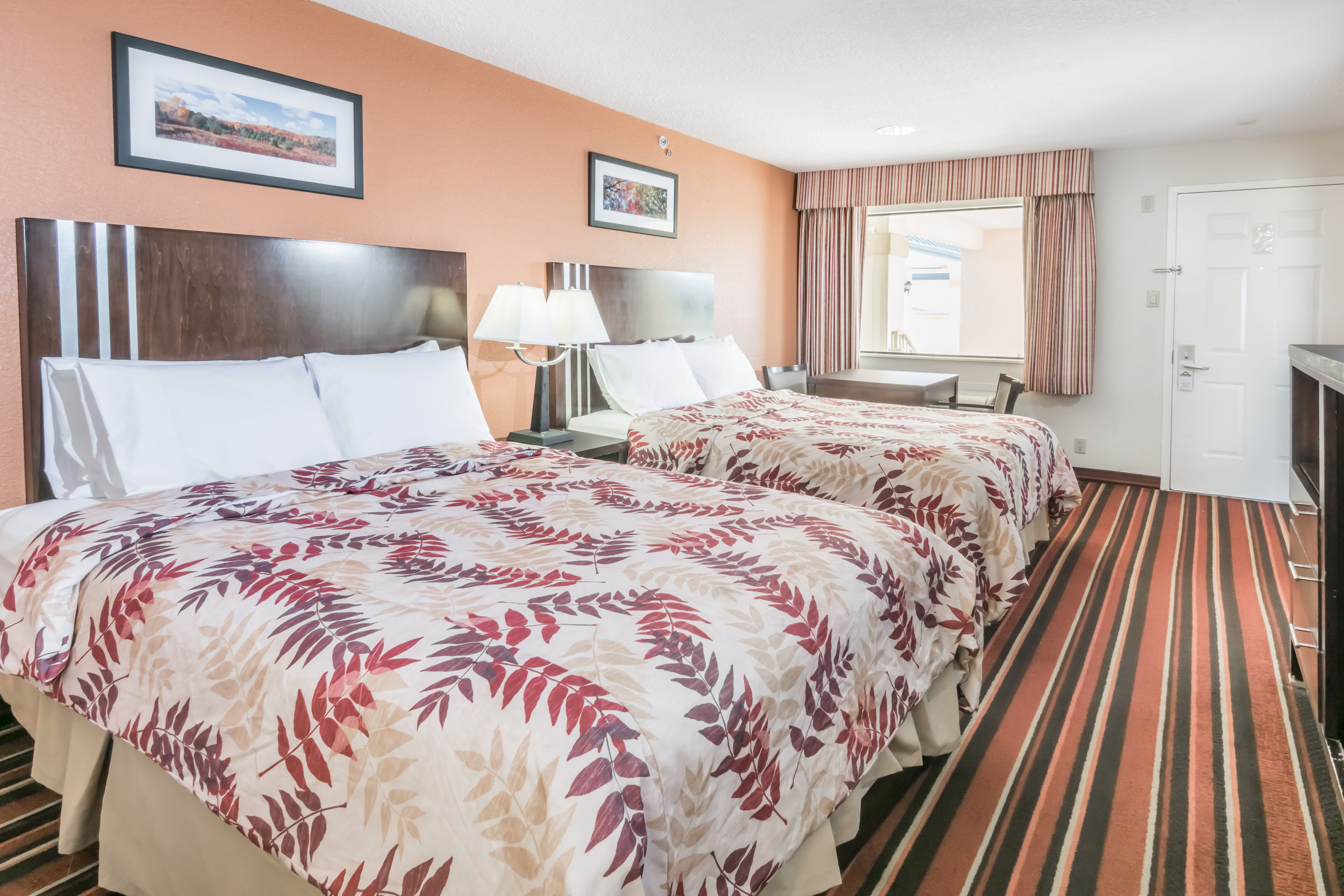 Guest room at the Days Inn & Suites by Wyndham Winnie in Winnie, Texas