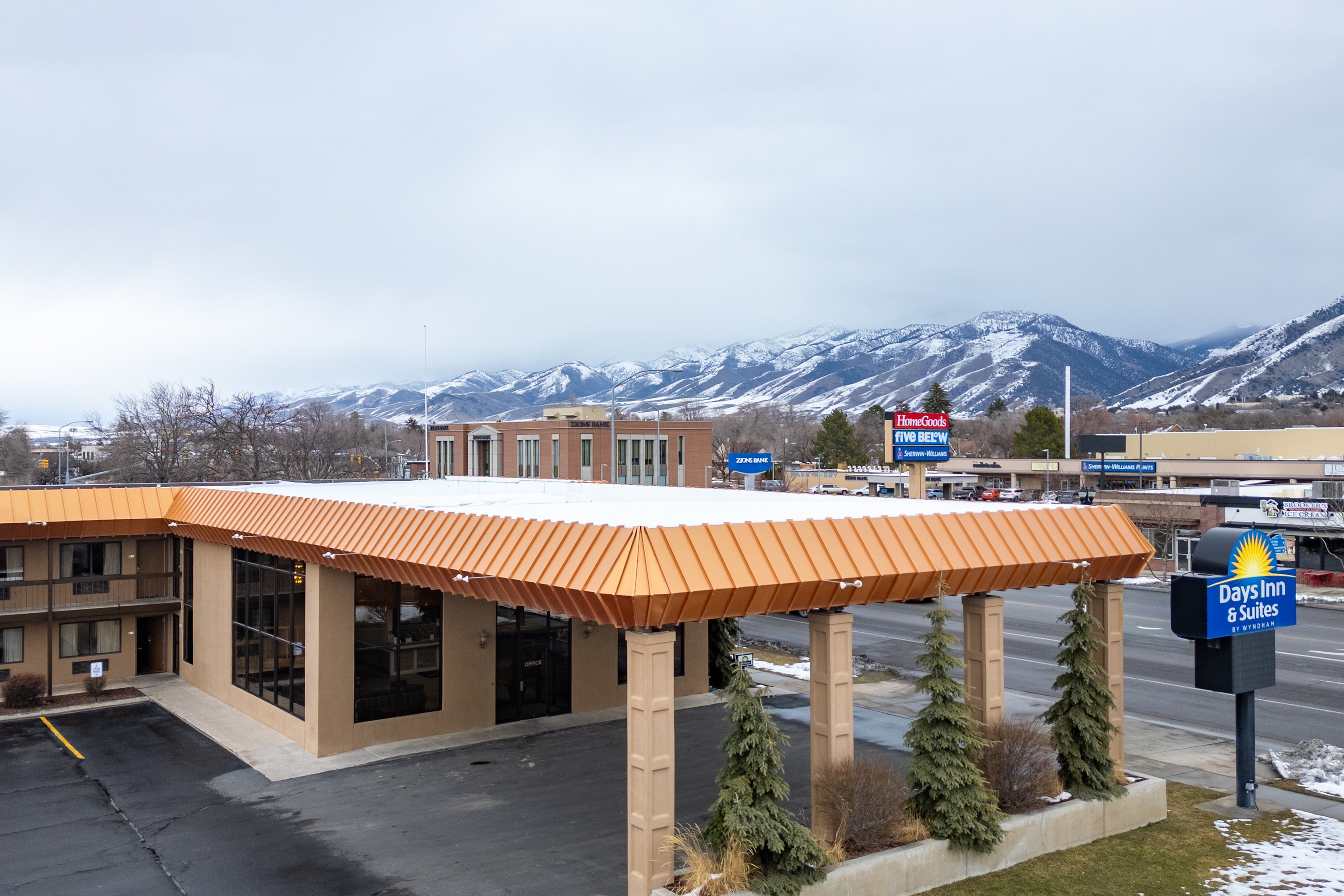 Exterior of Days Inn & Suites by Wyndham Logan hotel in Logan, Utah