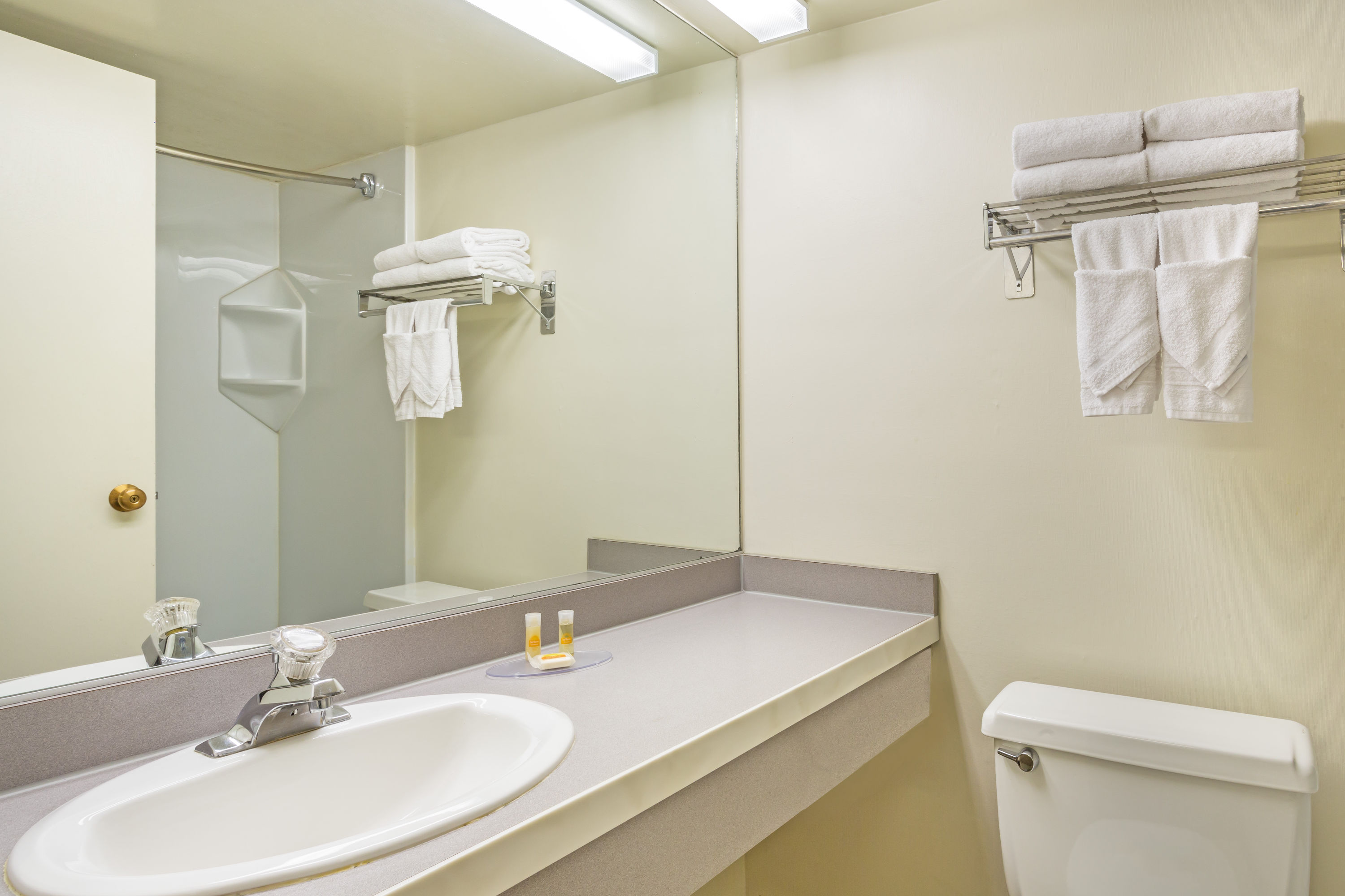 Guest room at the Days Inn & Suites by Wyndham Logan in Logan, Utah