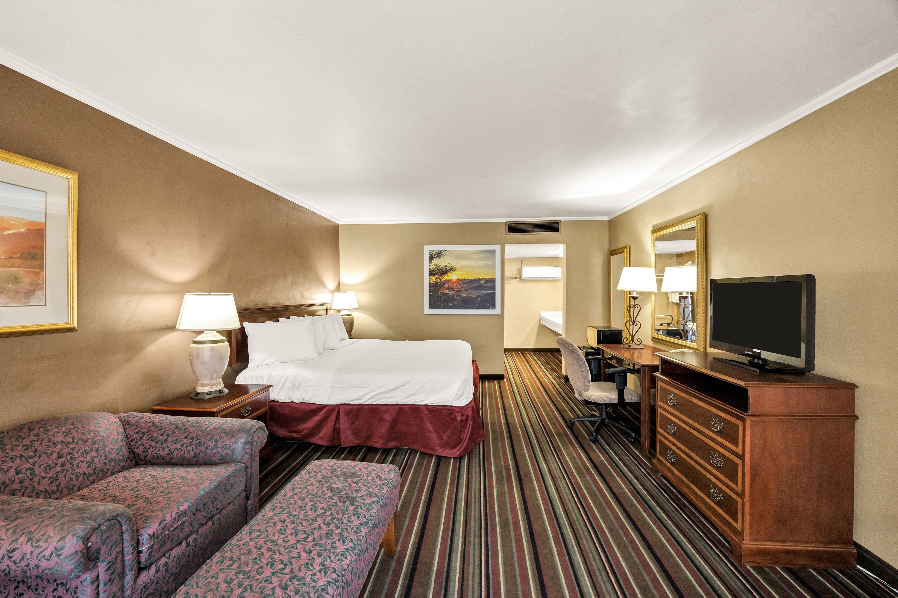 Guest room at the Days Inn & Suites by Wyndham Logan in Logan, Utah