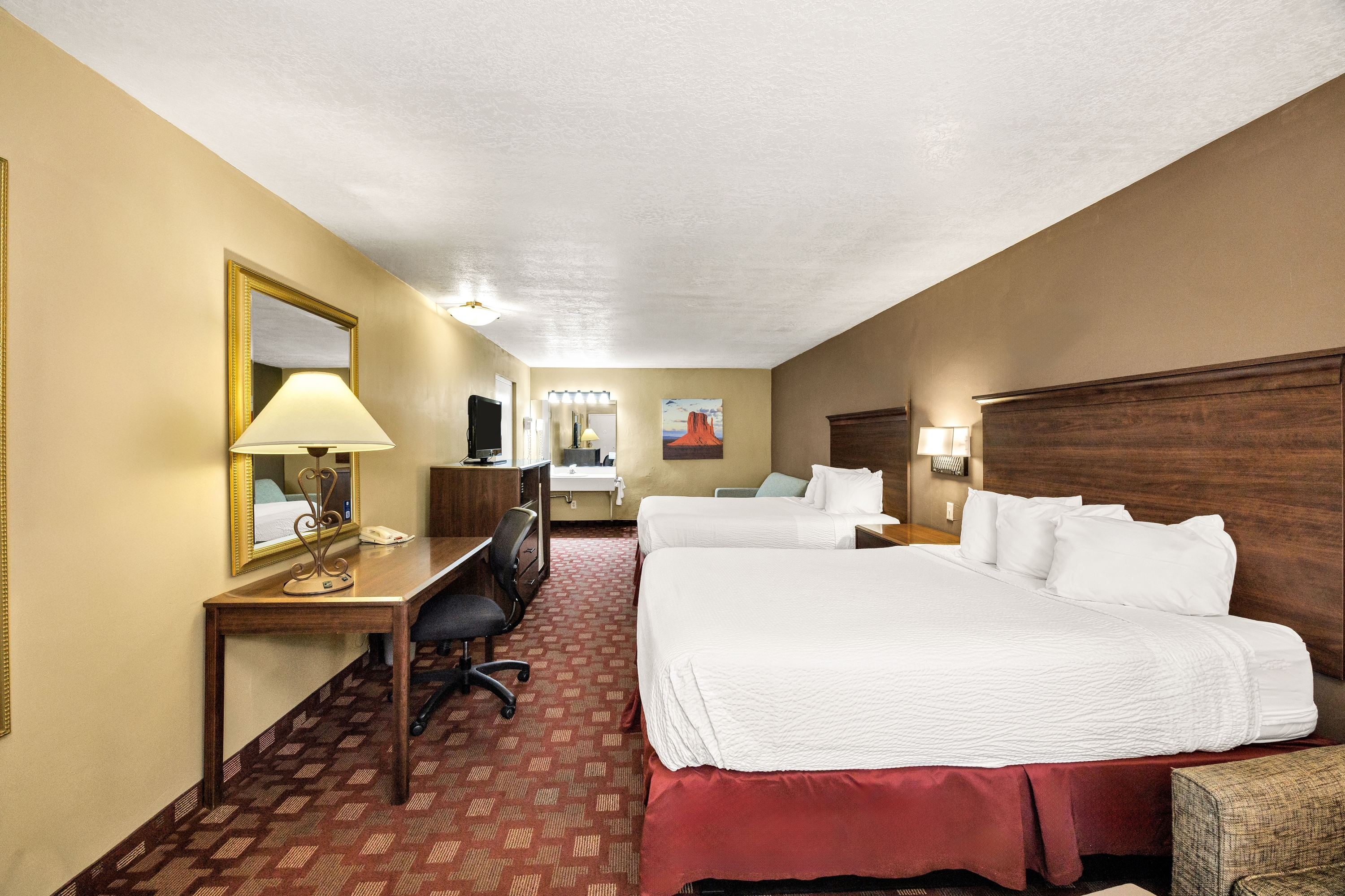 Guest room at the Days Inn & Suites by Wyndham Logan in Logan, Utah