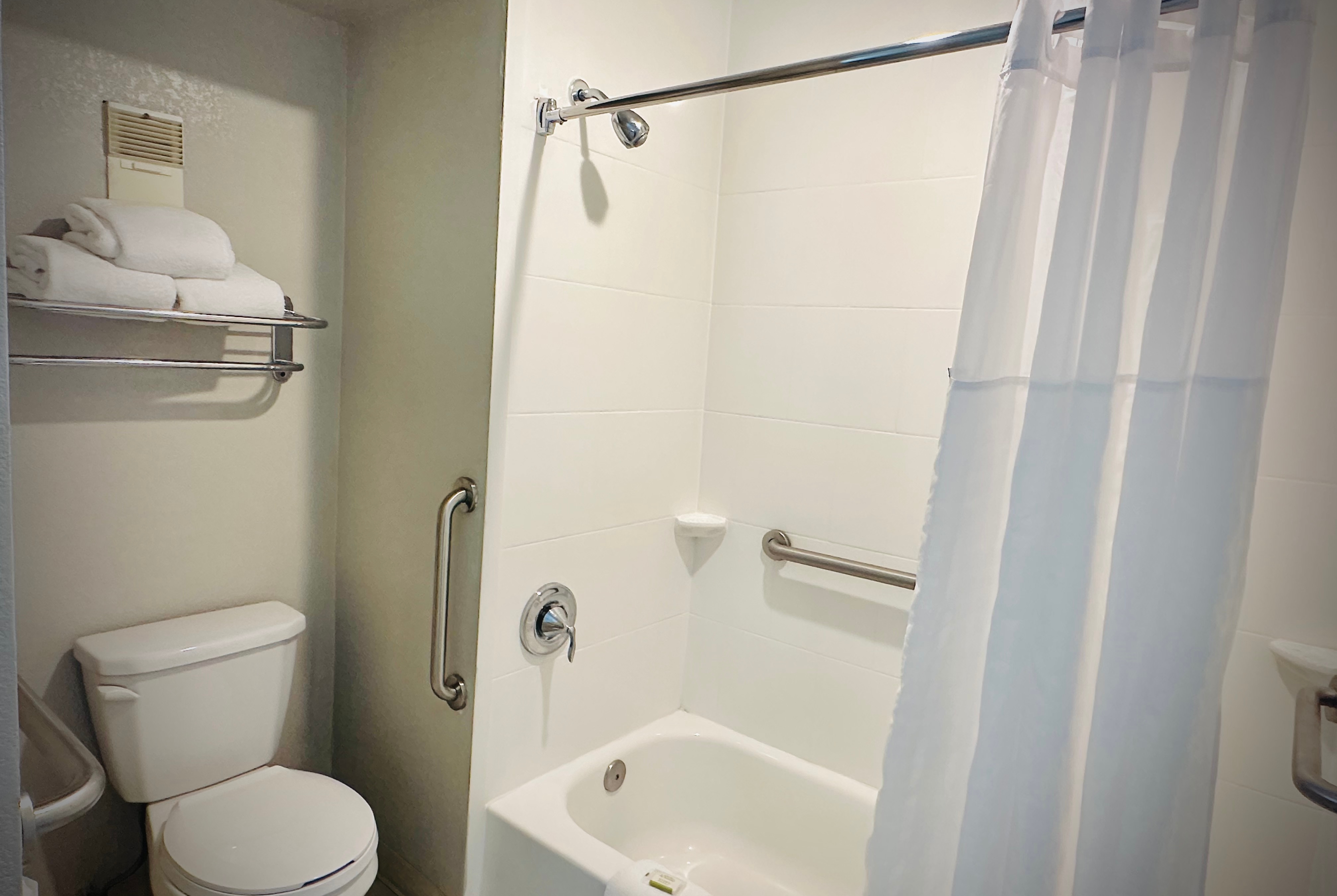 Guest room bath at the Days Inn by Wyndham Alexandria in Alexandria, Virginia