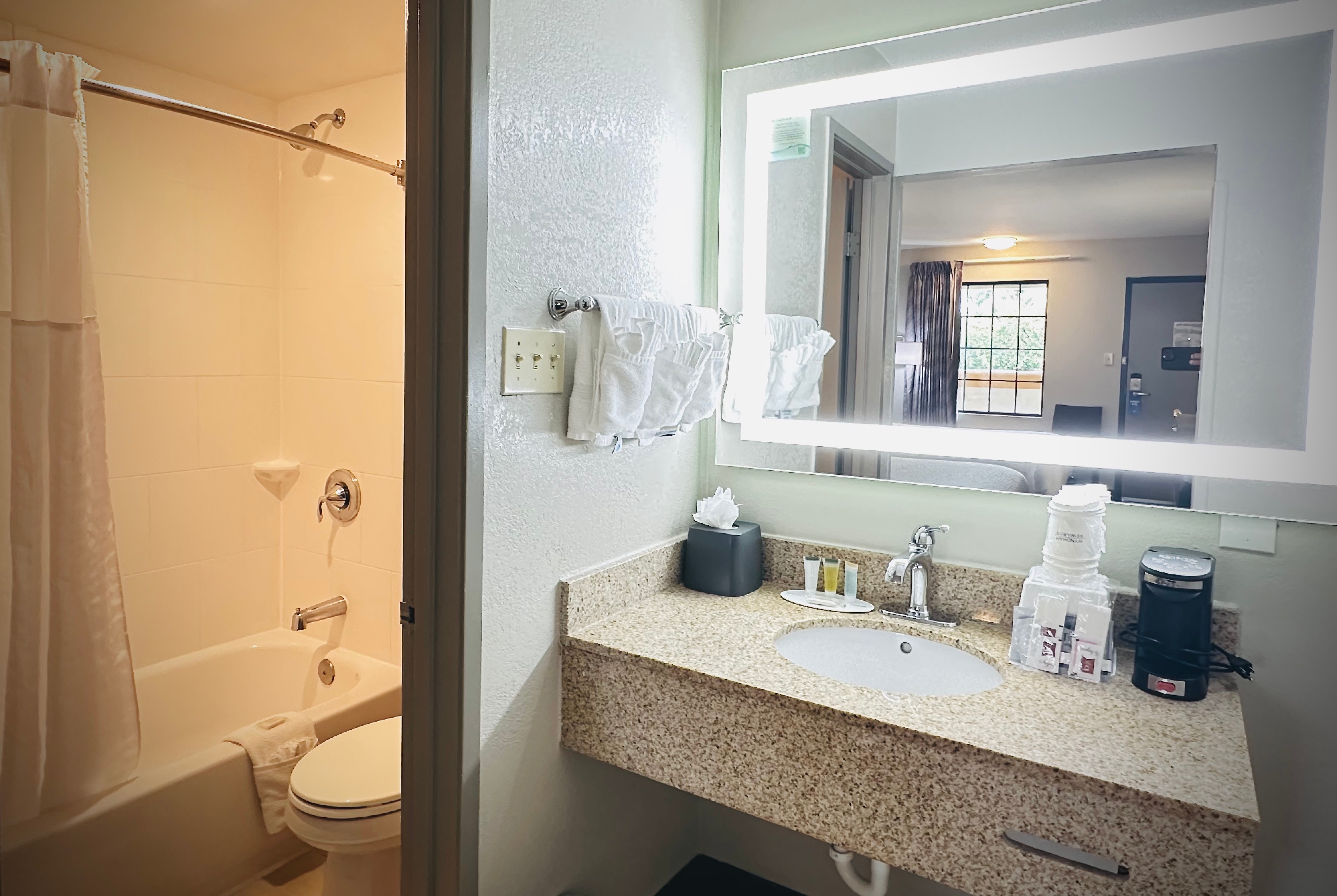 Guest room bath at the Days Inn by Wyndham Alexandria in Alexandria, Virginia
