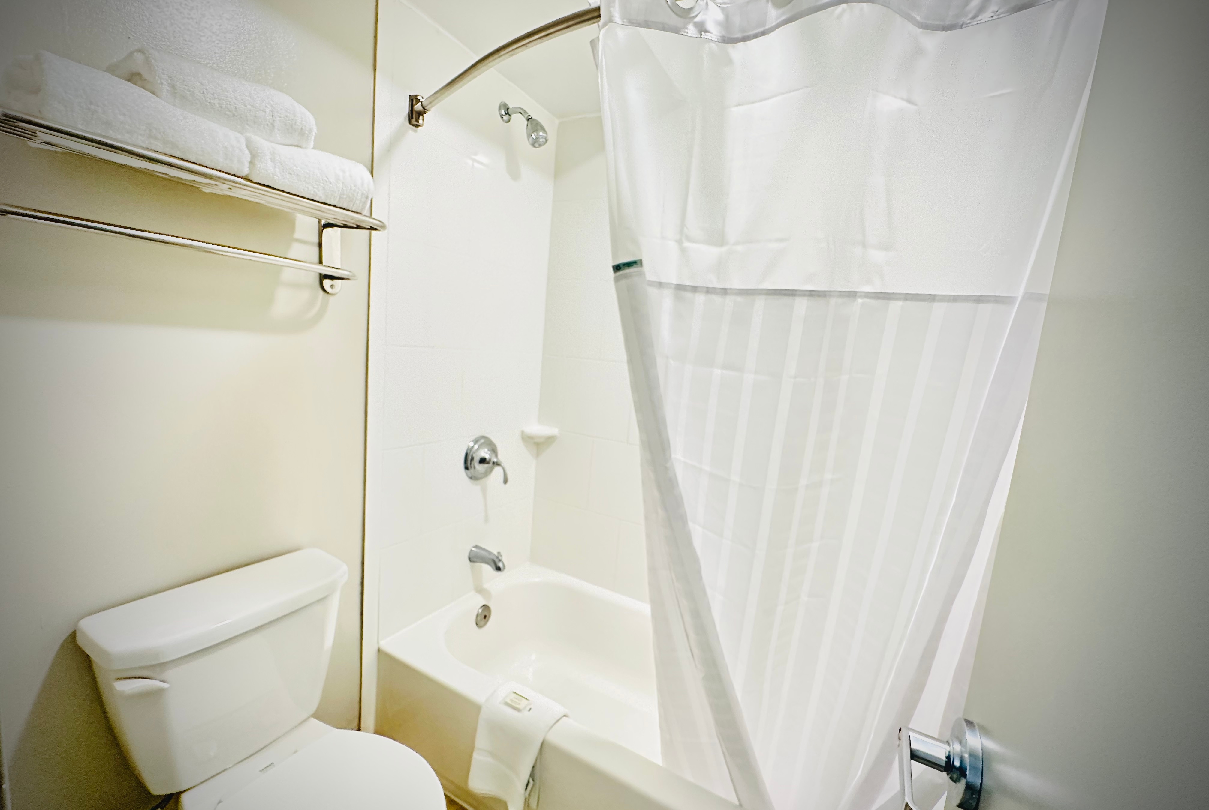 Guest room bath at the Days Inn by Wyndham Alexandria in Alexandria, Virginia