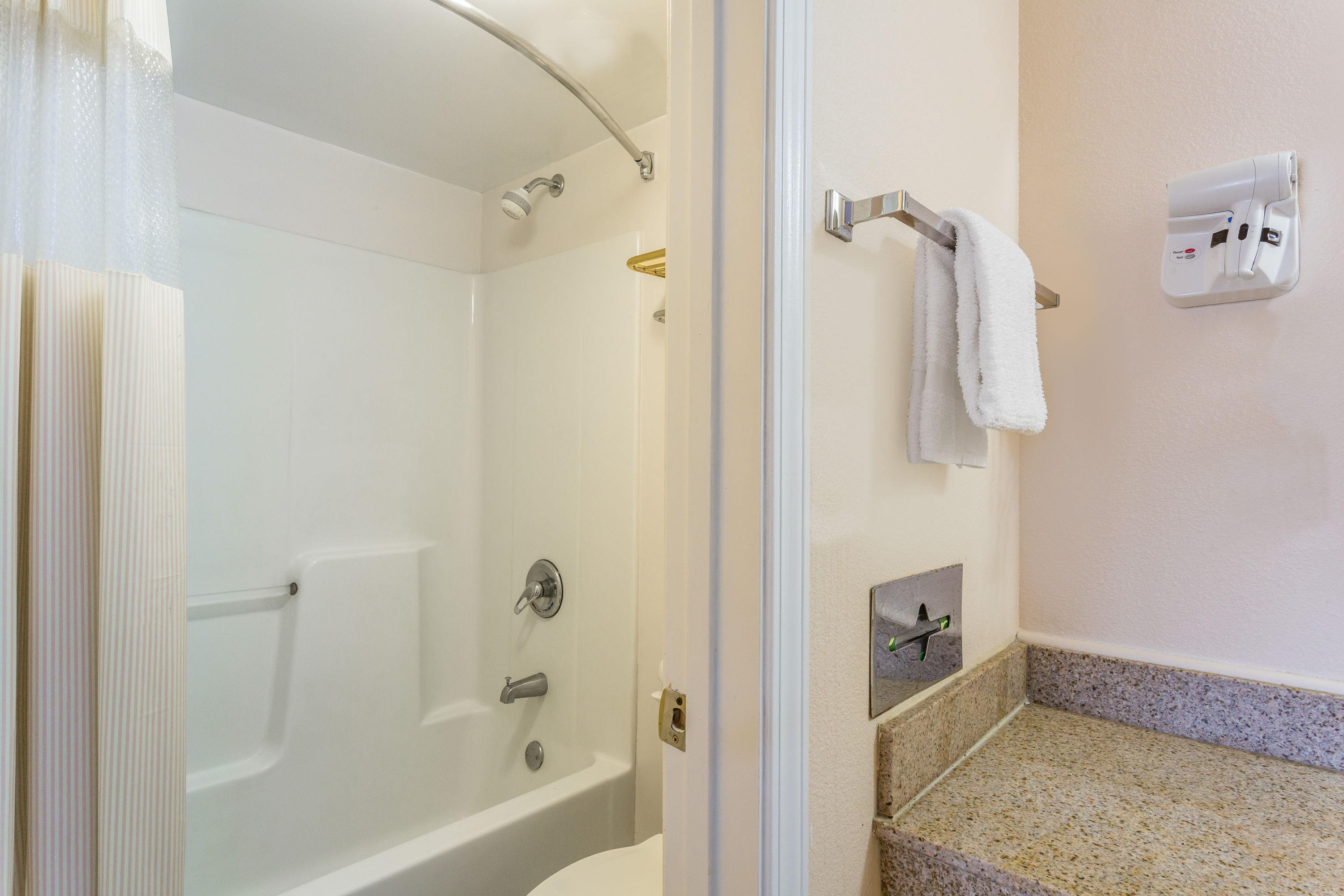 Guest room bath at the Days Inn by Wyndham Ashland in Ashland, Virginia