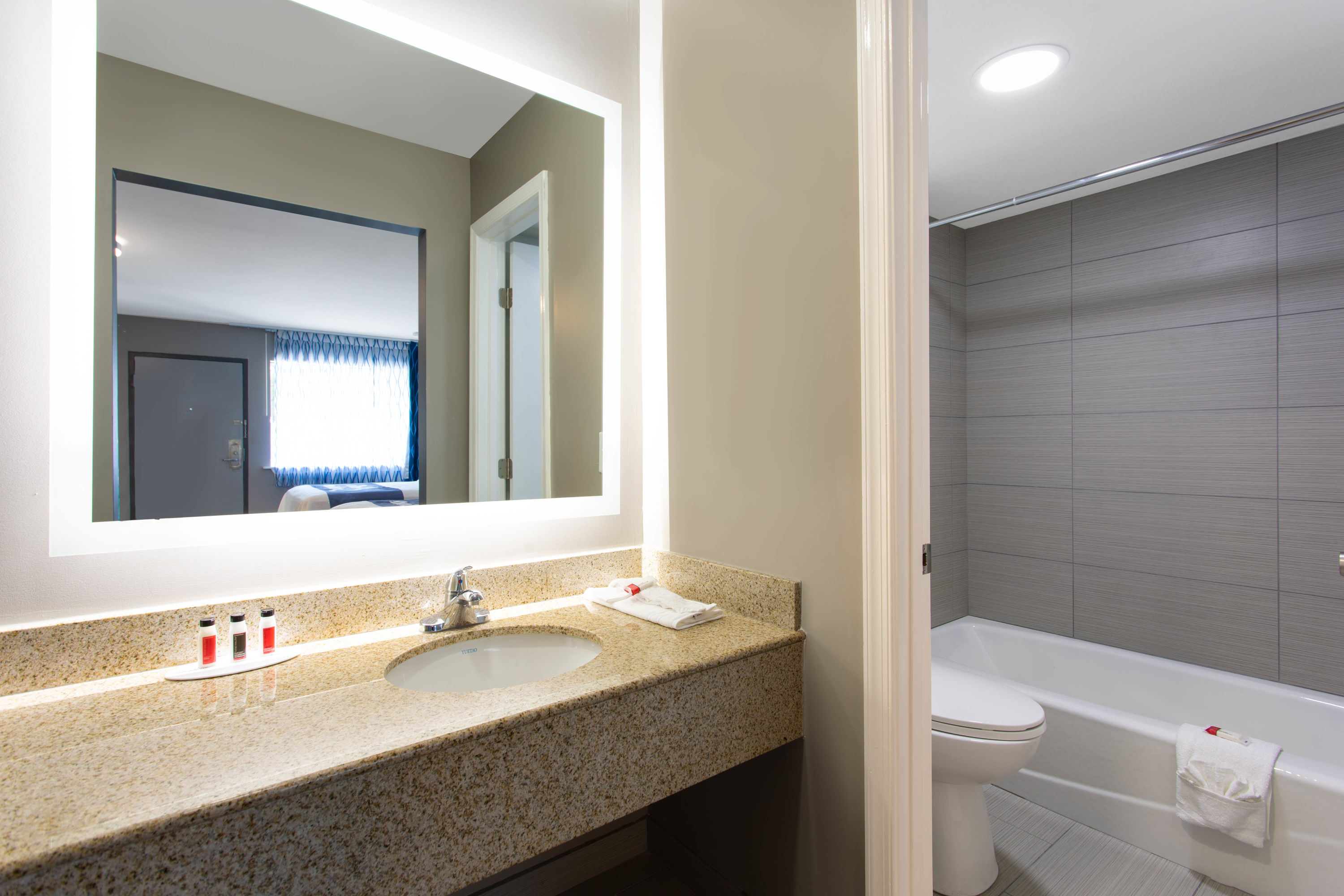 Guest room bath at the Days Inn by Wyndham Chesapeake in Chesapeake, Virginia