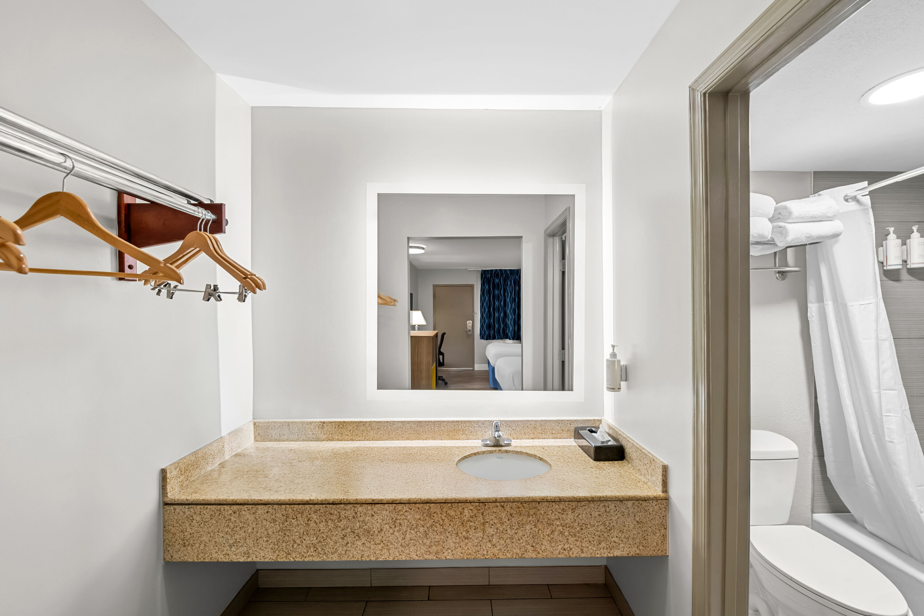 Guest room bath at the Days Inn by Wyndham Chesapeake in Chesapeake, Virginia