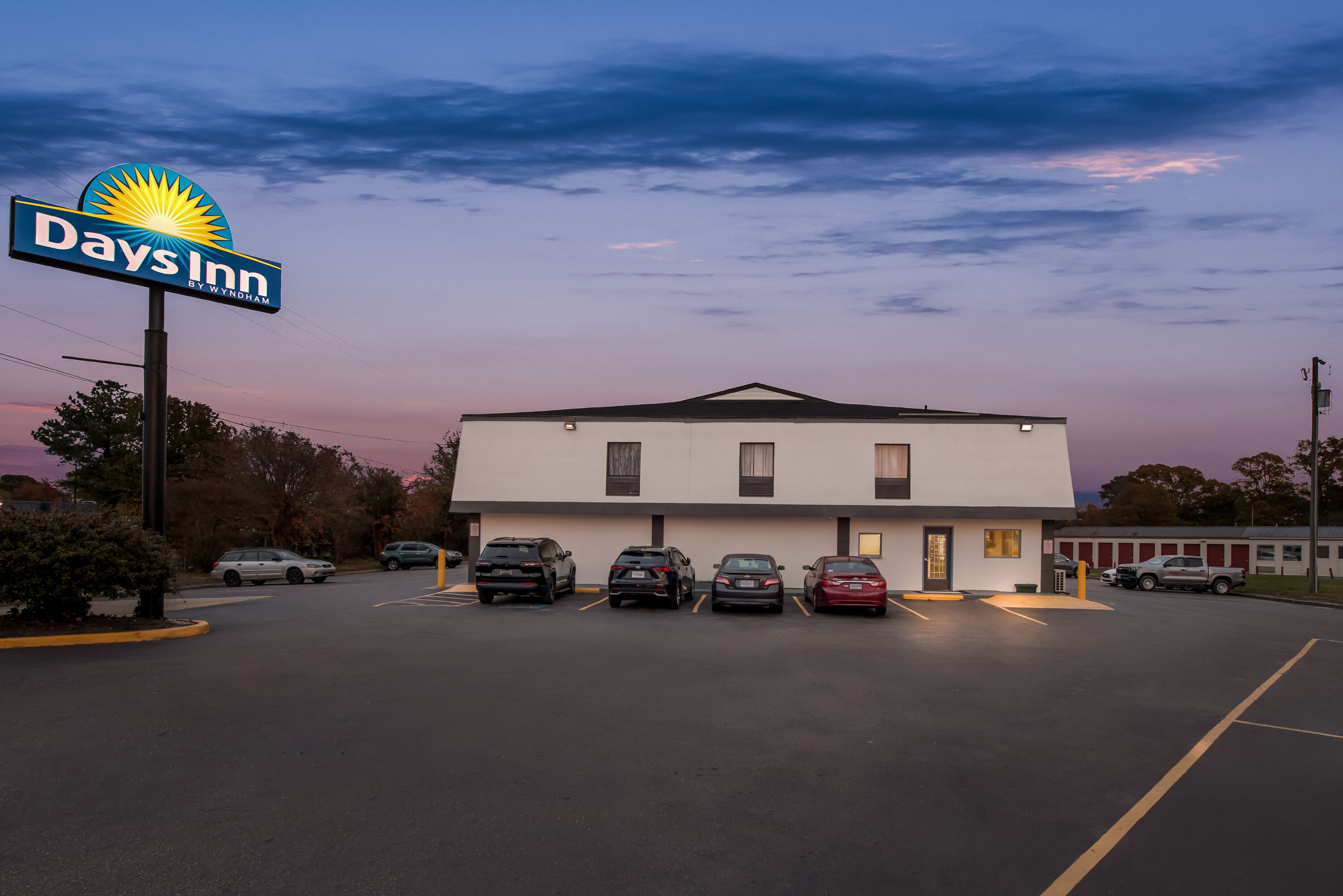 Exterior Night Image of Days Inn by Wyndham Chesapeake hotel in Chesapeake, Virginia