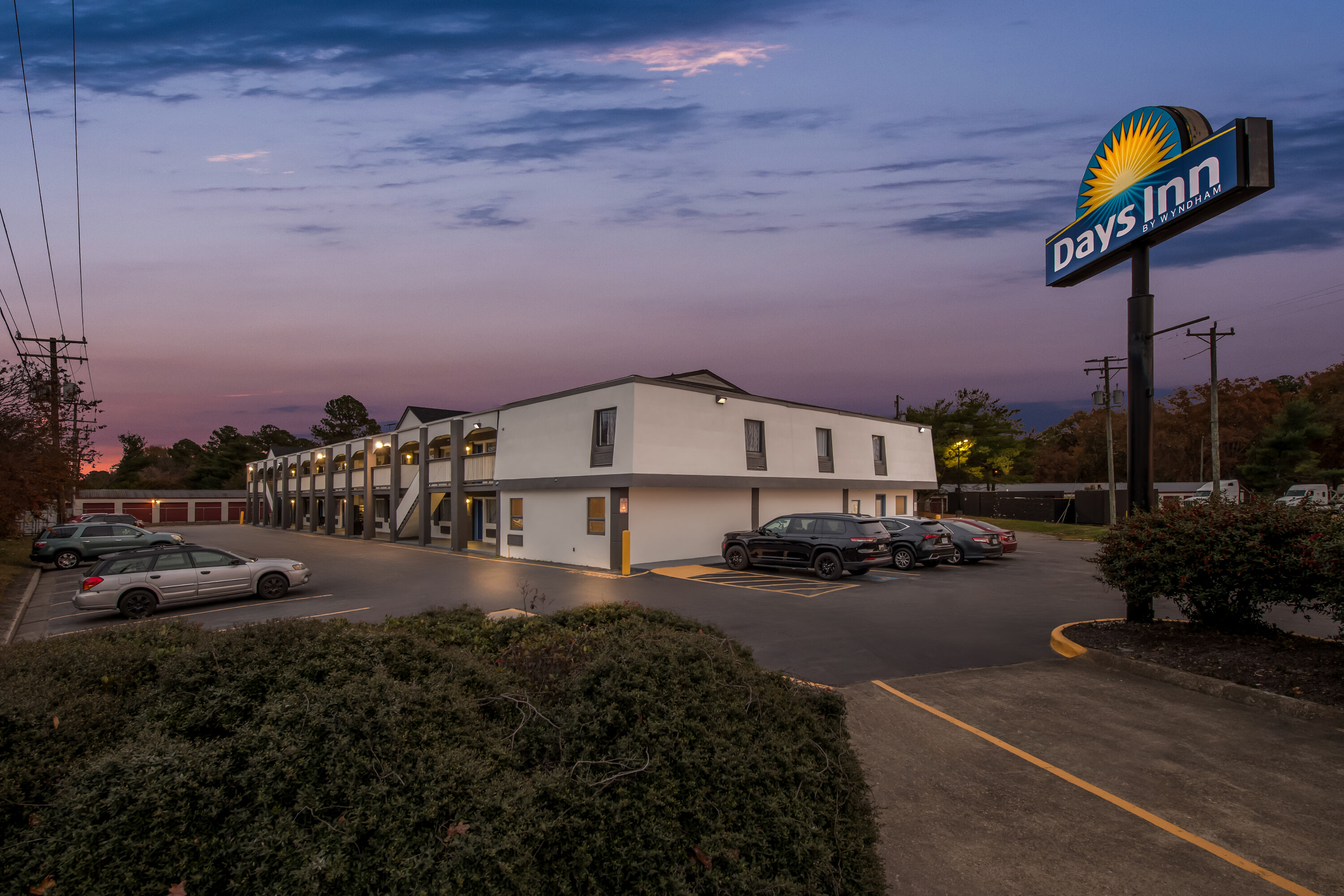 Exterior Night Image of Days Inn by Wyndham Chesapeake hotel in Chesapeake, Virginia