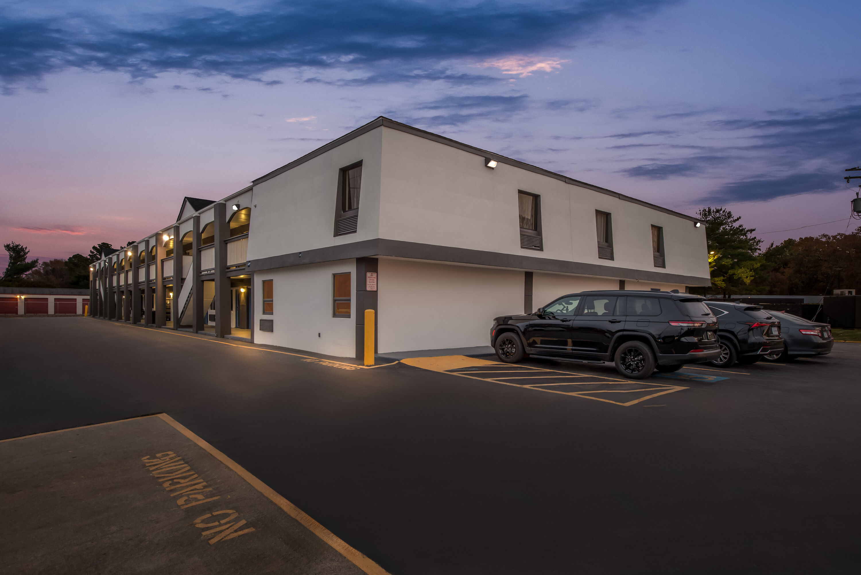 Exterior Night Image of Days Inn by Wyndham Chesapeake hotel in Chesapeake, Virginia