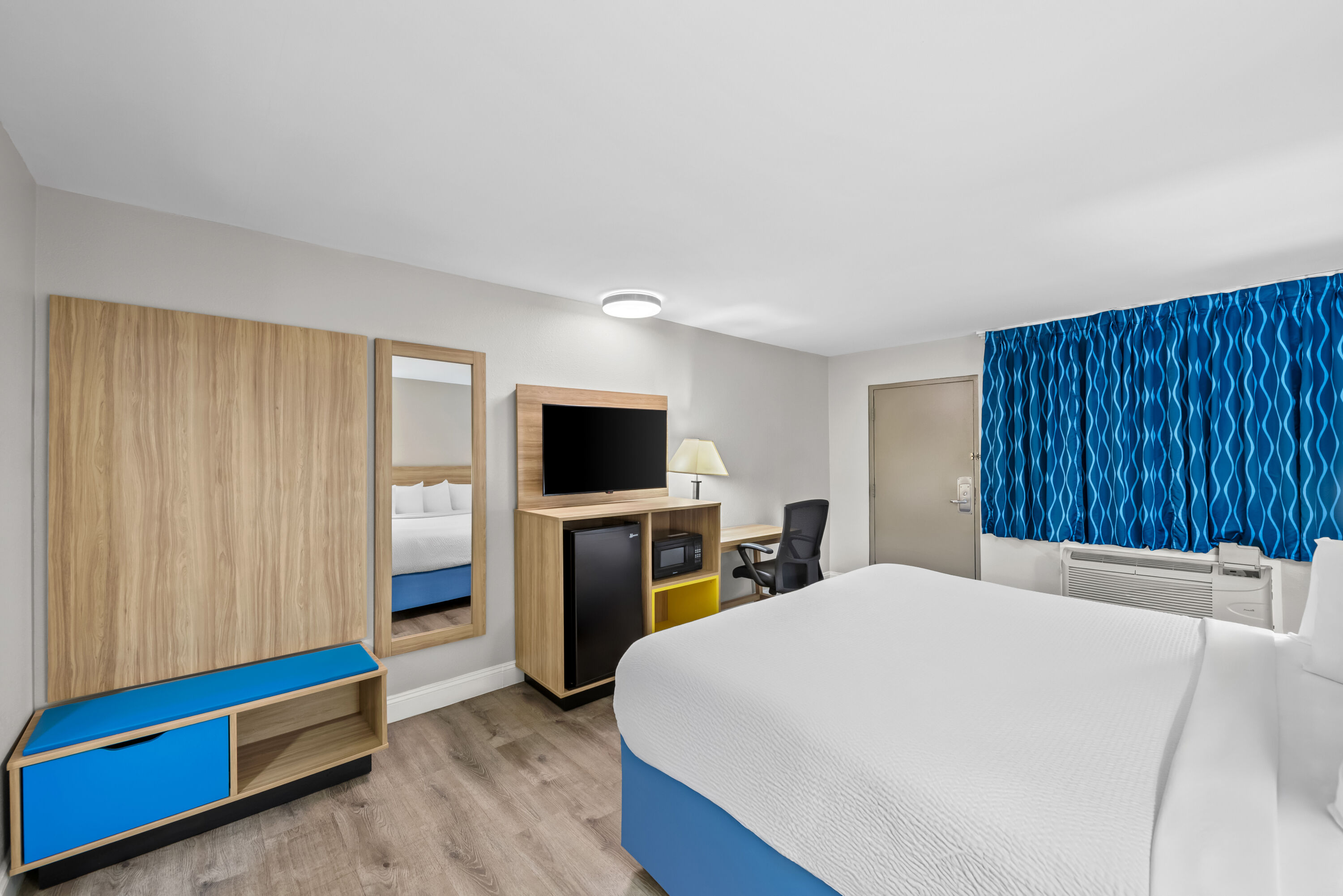 King bed guest room at the Days Inn by Wyndham Chesapeake in Chesapeake, Virginia