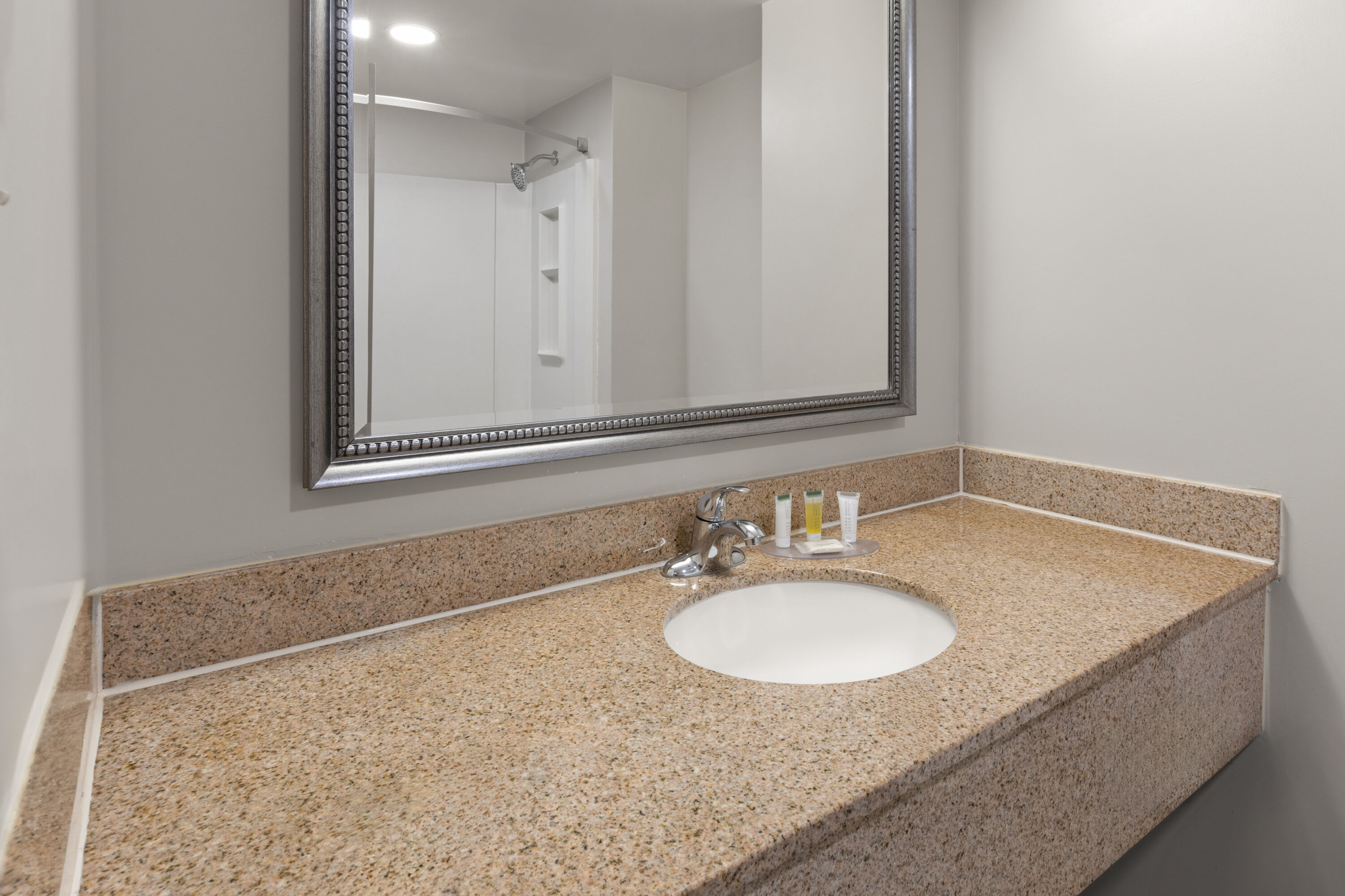 Guest room bath at the Days Inn by Wyndham Dumfries Quantico in Dumfries, Virginia