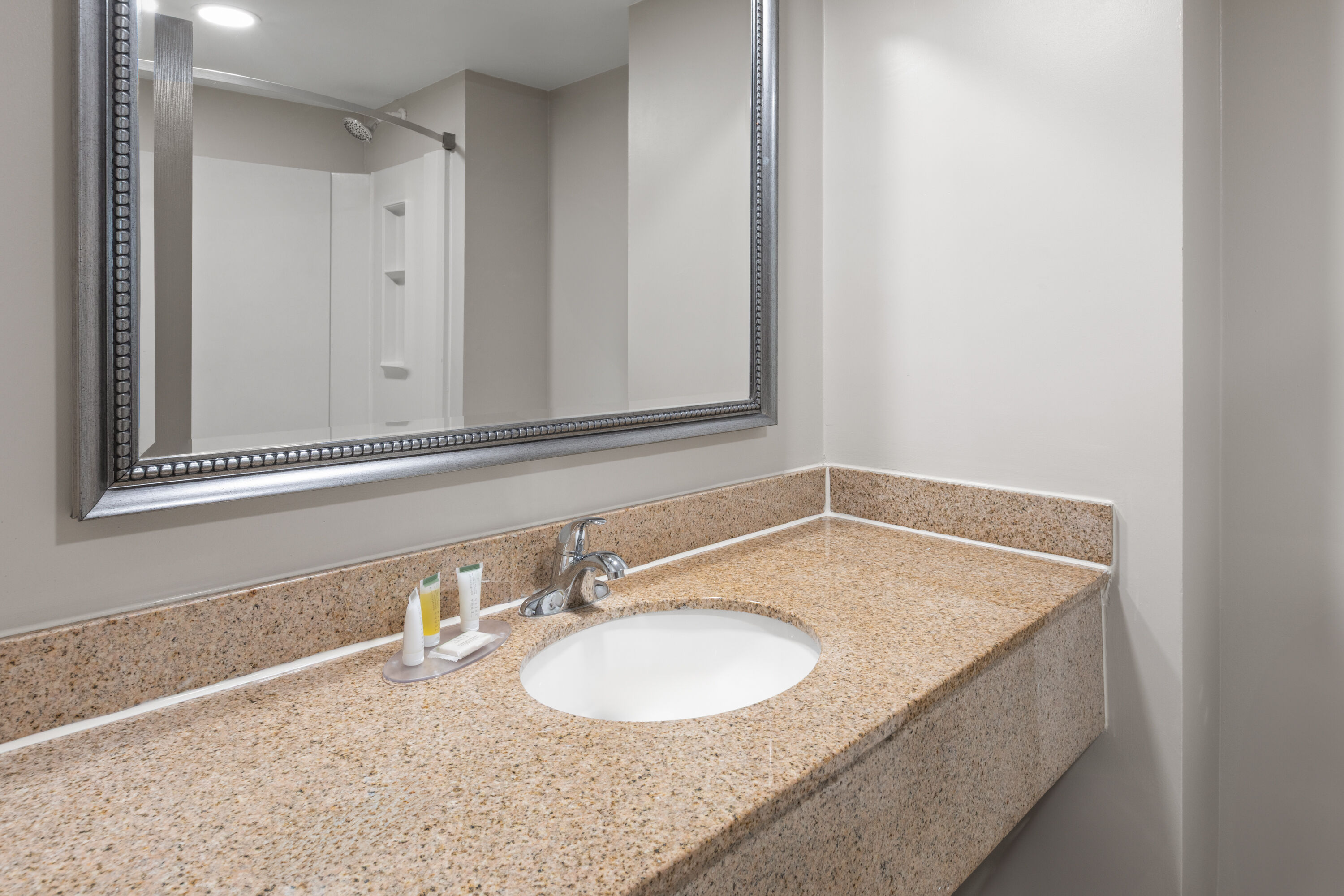 Guest room bath at the Days Inn by Wyndham Dumfries Quantico in Dumfries, Virginia