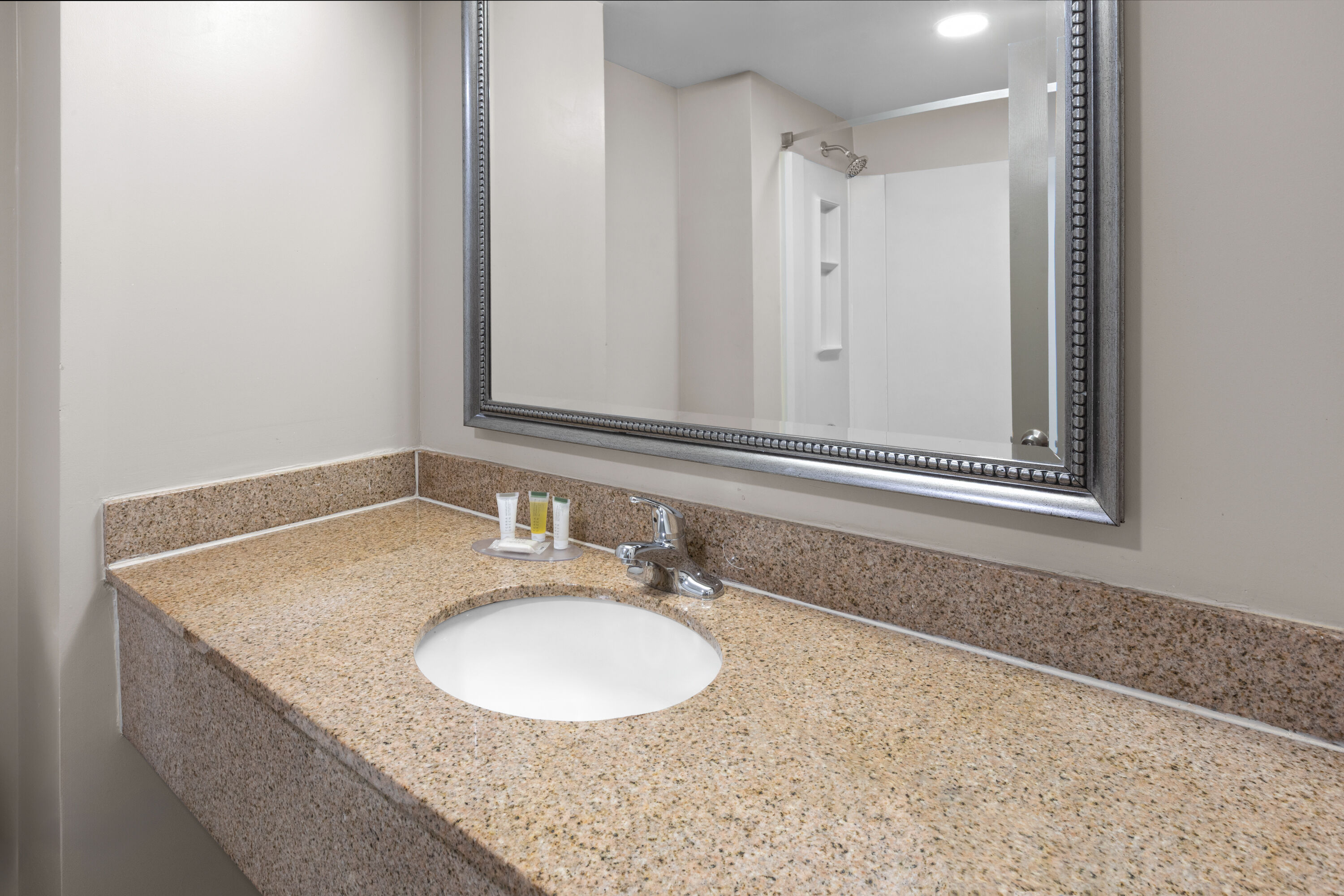 Guest room bath at the Days Inn by Wyndham Dumfries Quantico in Dumfries, Virginia