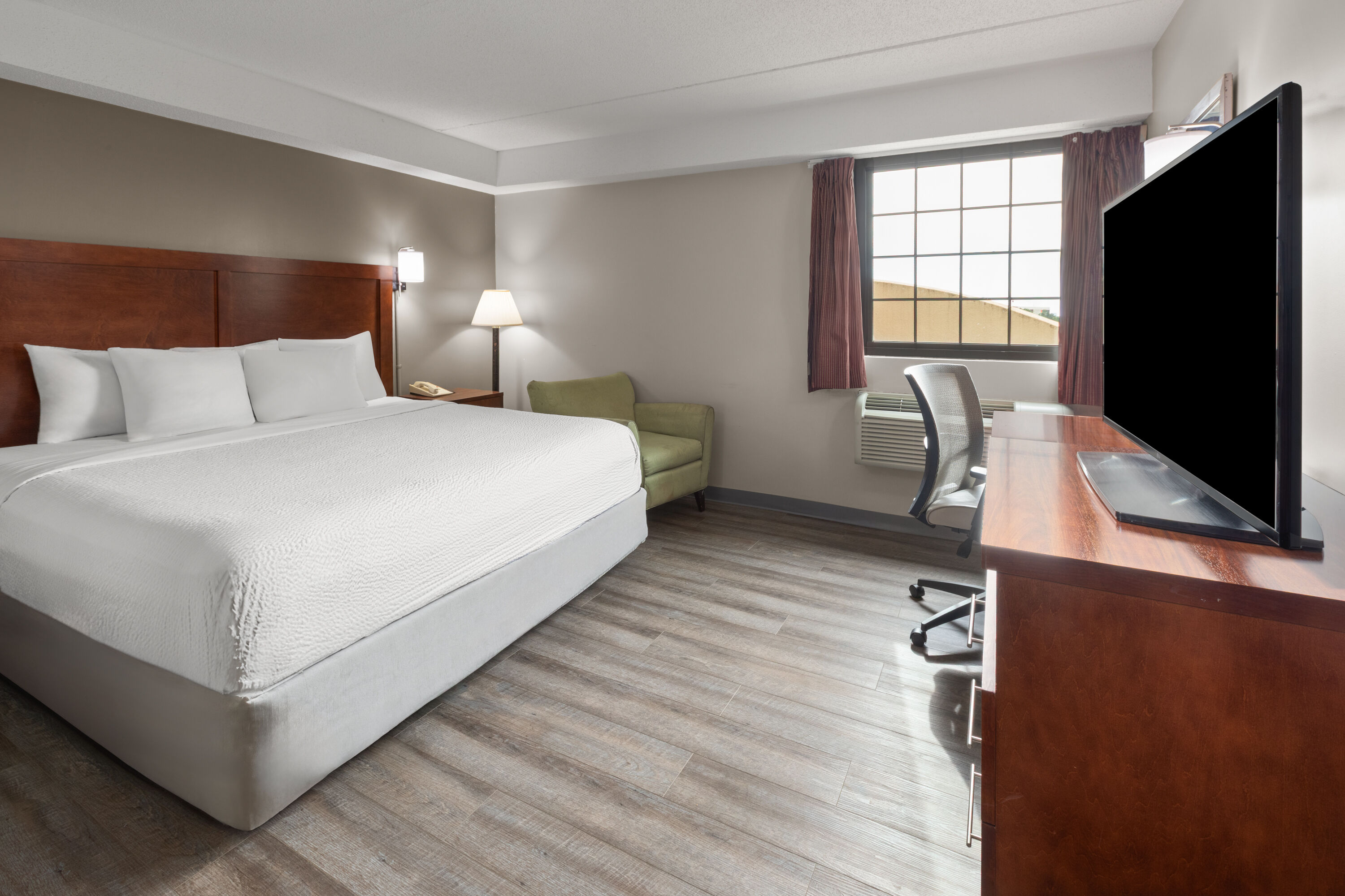 Guest room at the Days Inn by Wyndham Dumfries Quantico in Dumfries, Virginia