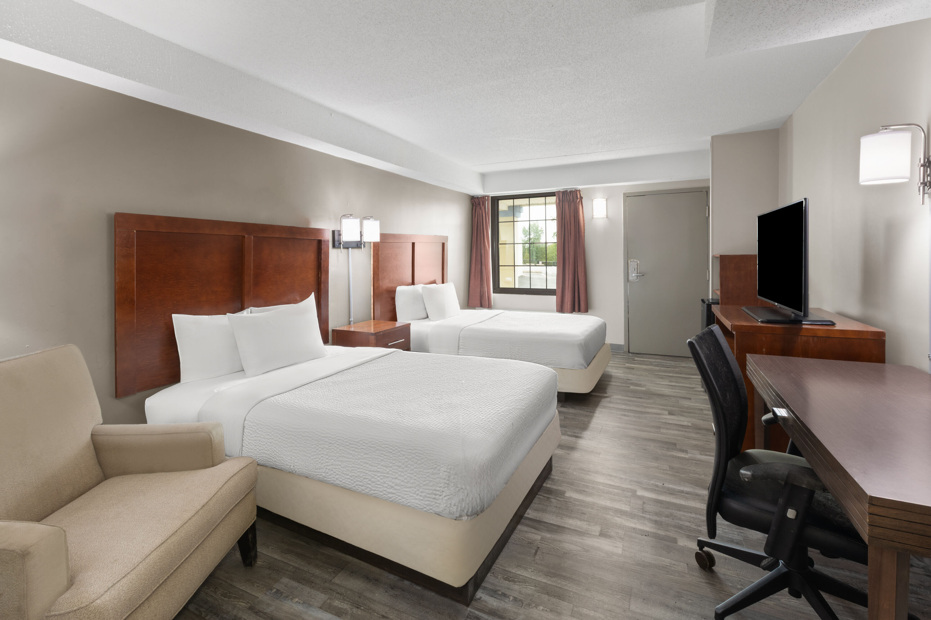 Guest room at the Days Inn by Wyndham Dumfries Quantico in Dumfries, Virginia