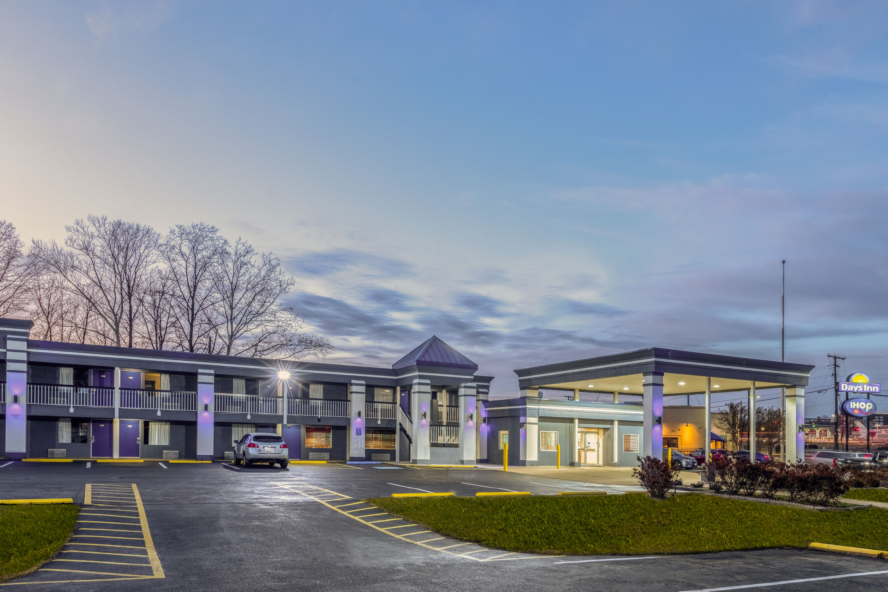 Exterior Dusk Image of Days Inn by Wyndham Fredericksburg North hotel in Fredericksburg, Virginia