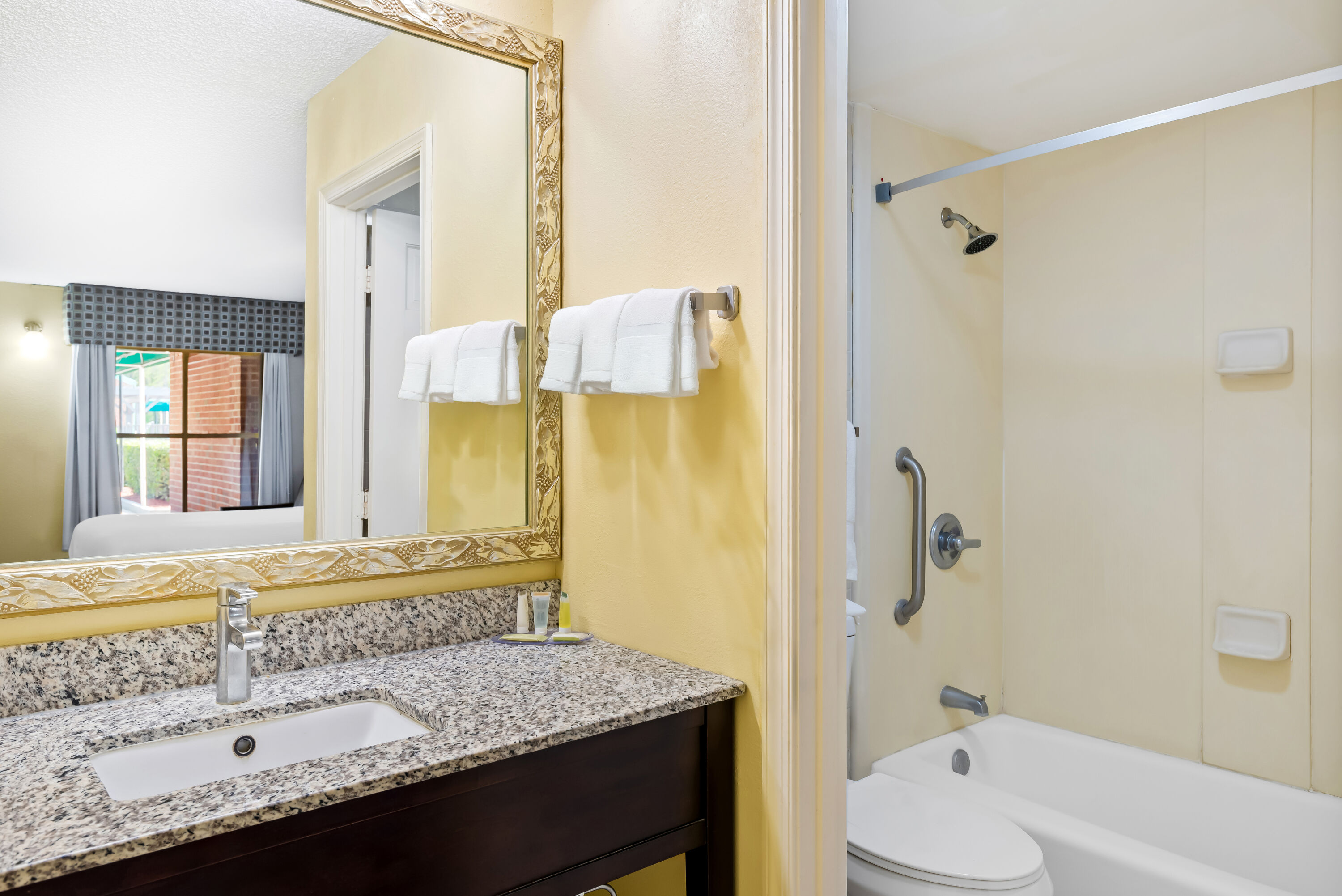 Guest room bath at the Days Inn by Wyndham Petersburg/South Fort Lee in Petersburg, Virginia