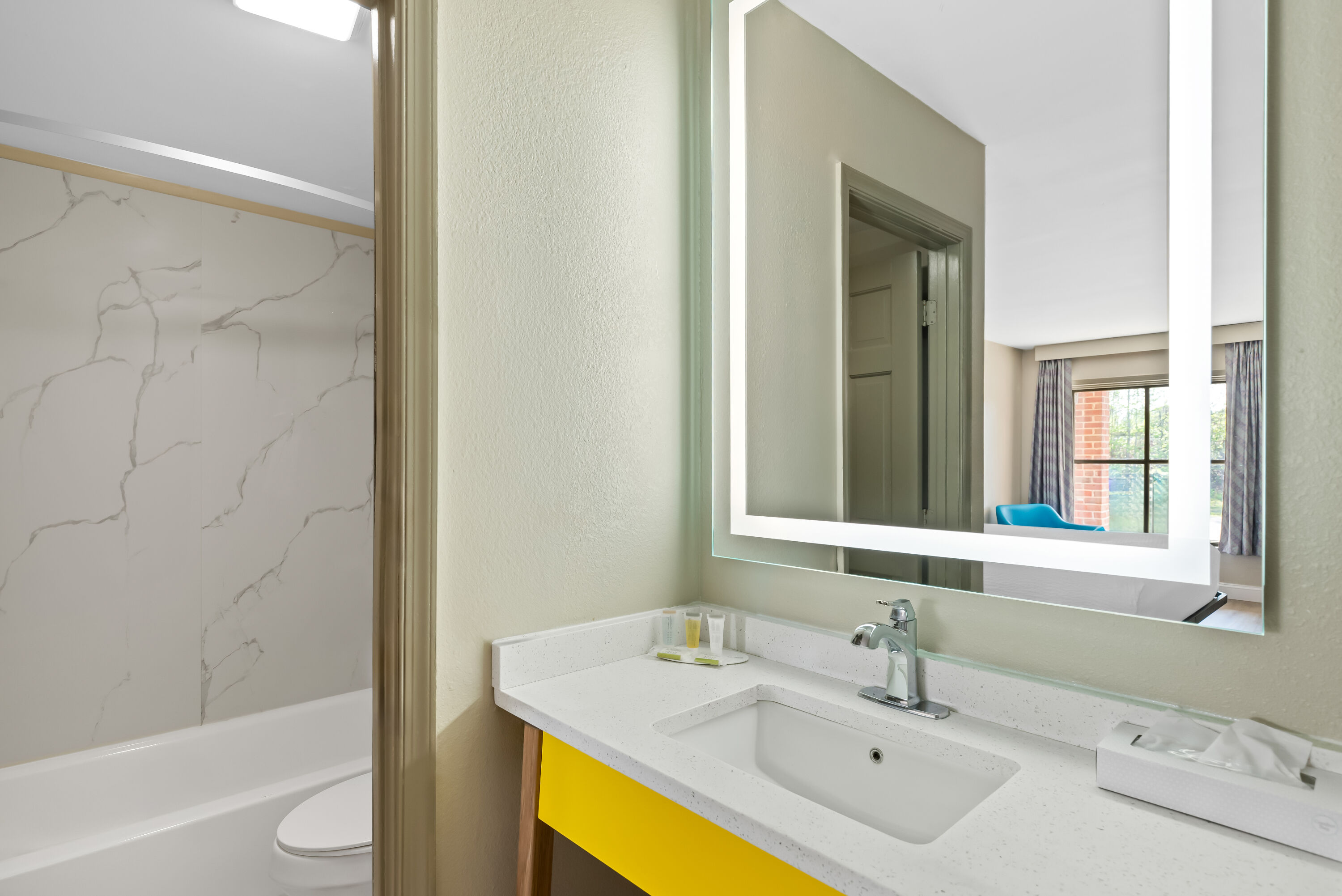Guest room bath at the Days Inn by Wyndham Petersburg/South Fort Lee in Petersburg, Virginia
