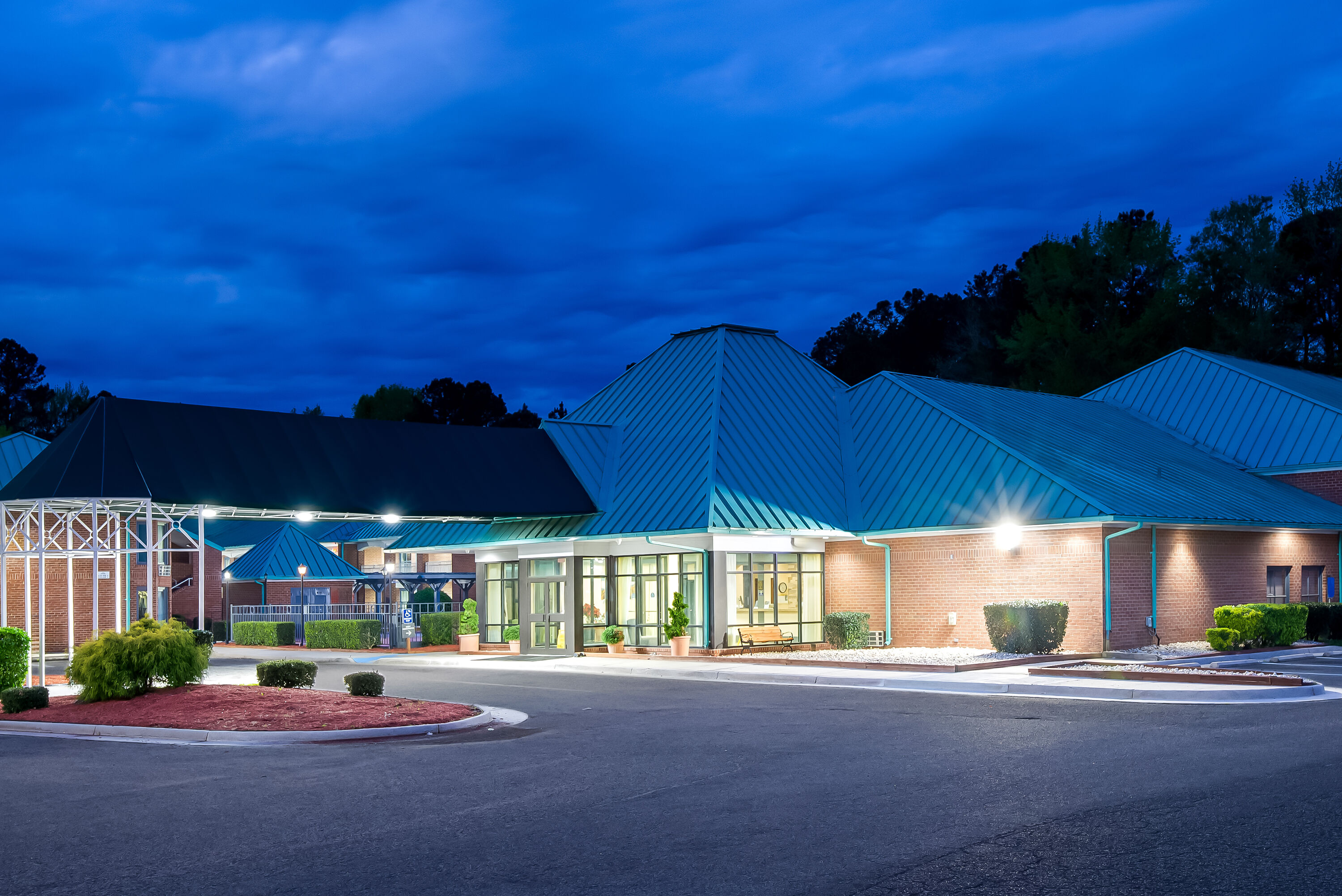 Exterior Night Image of Days Inn by Wyndham Petersburg/South Fort Lee hotel in Petersburg, Virginia