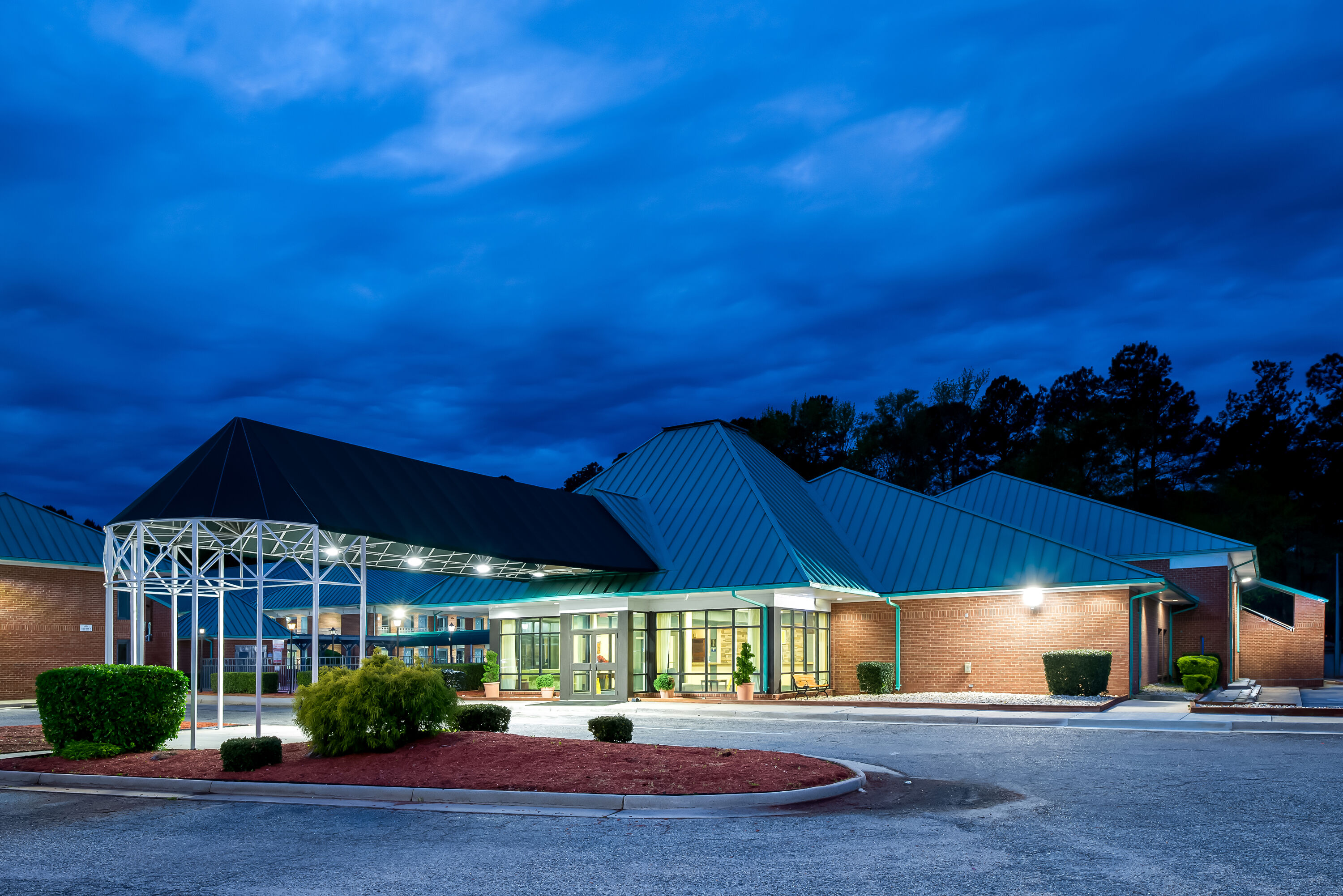 Exterior Night Image of Days Inn by Wyndham Petersburg/South Fort Lee hotel in Petersburg, Virginia
