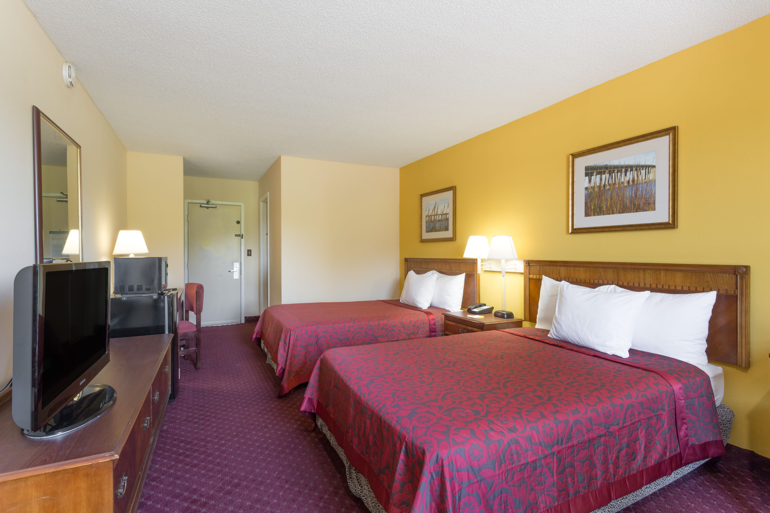 Guest room at the Days Inn by Wyndham Tappahannock in Tappahannock, Virginia