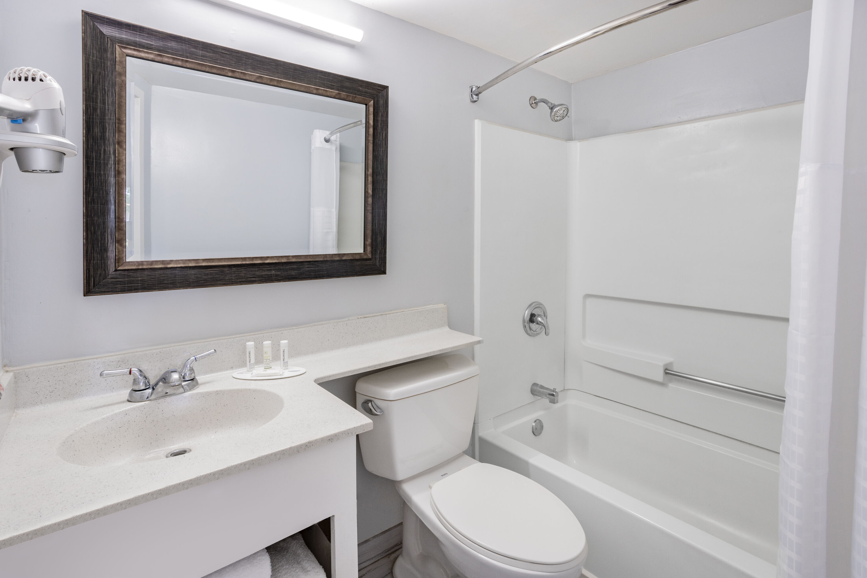 Guest room bath at the Days Inn & Suites by Wyndham Williamsburg Colonial in Williamsburg, Virginia