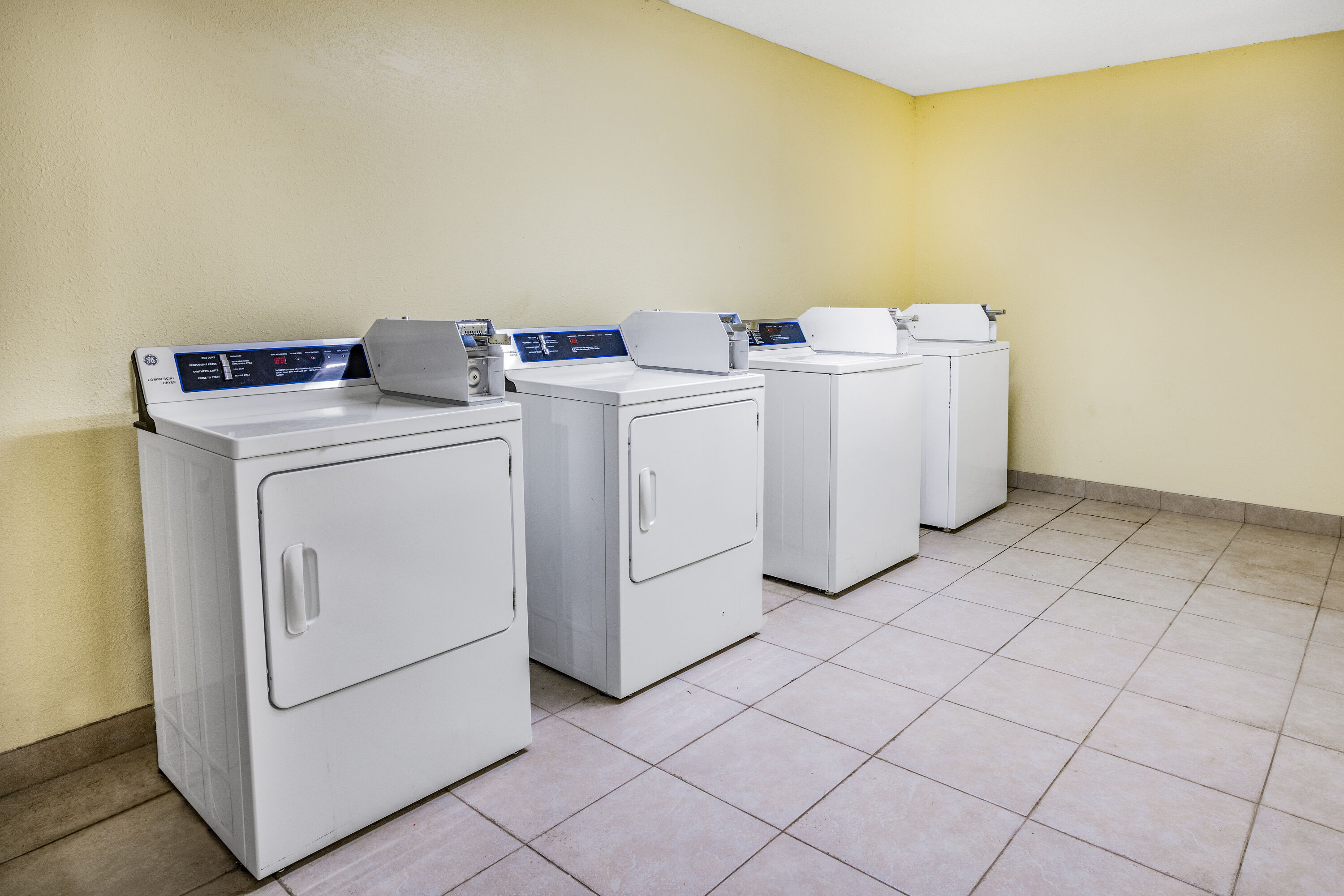 Laundry facilities at Days Inn & Suites by Wyndham Williamsburg Colonial in Williamsburg, Virginia