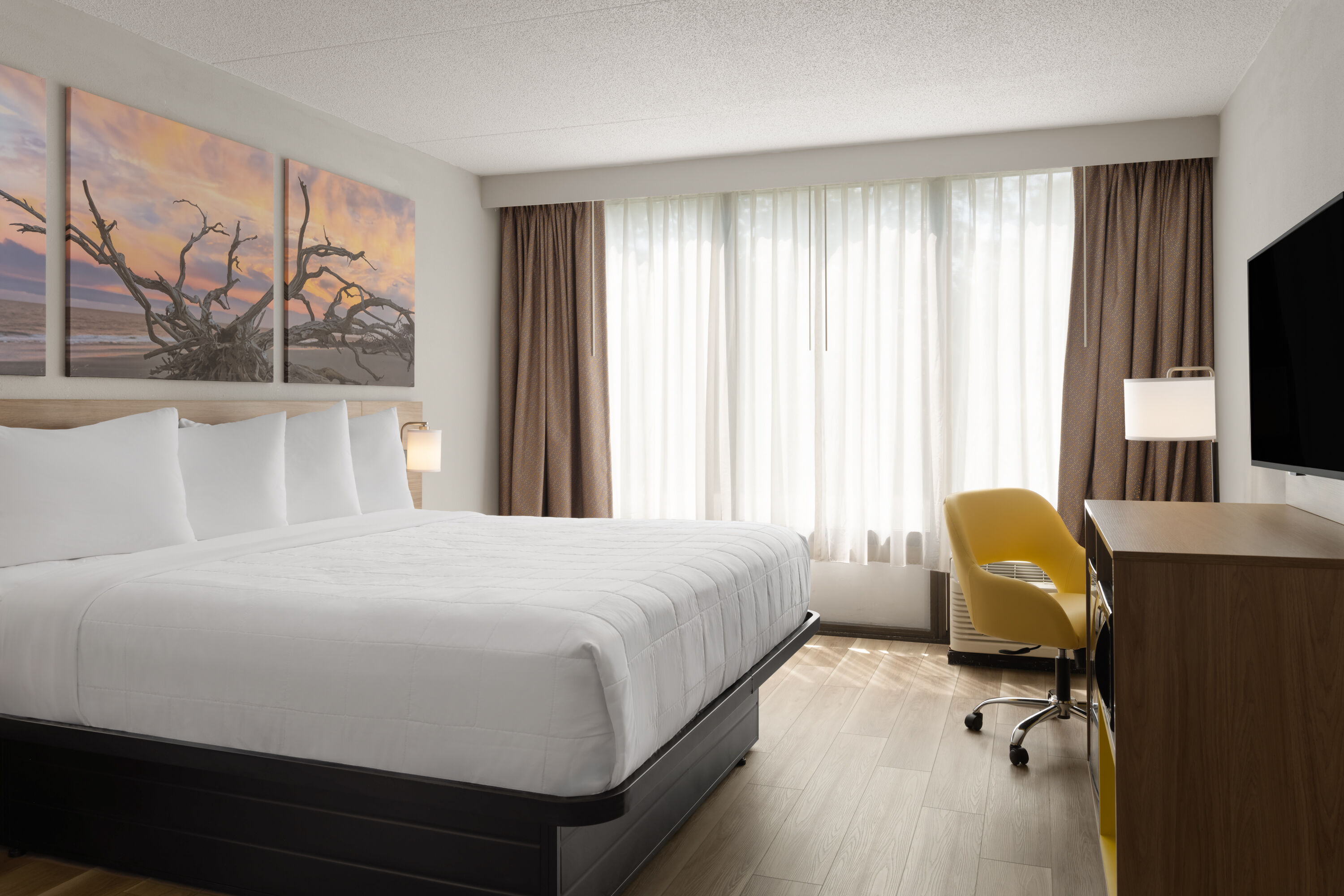 Guest room at the Days Hotel by Wyndham Williamsburg I-64 in Williamsburg, Virginia