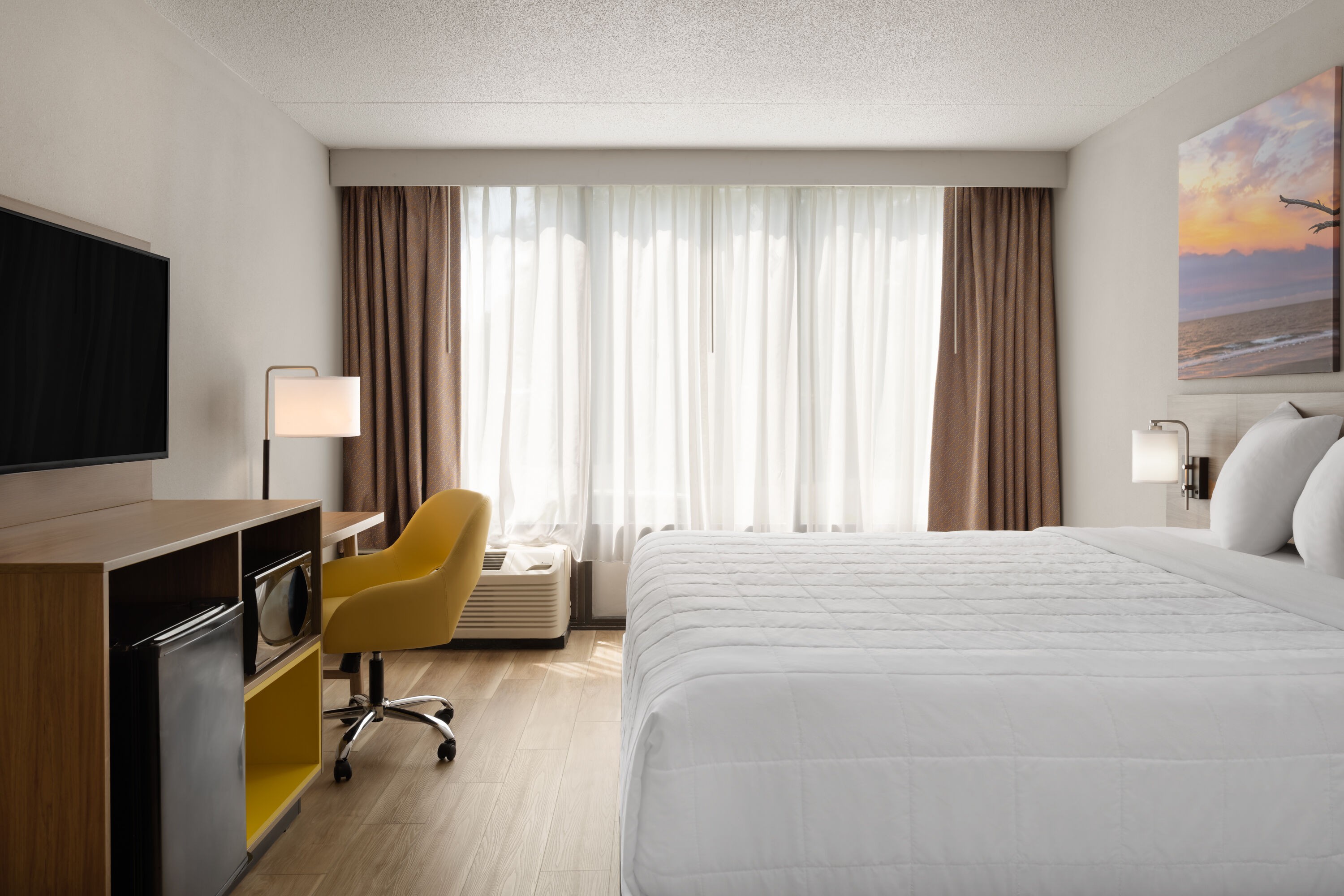 Guest room at the Days Hotel by Wyndham Williamsburg I-64 in Williamsburg, Virginia