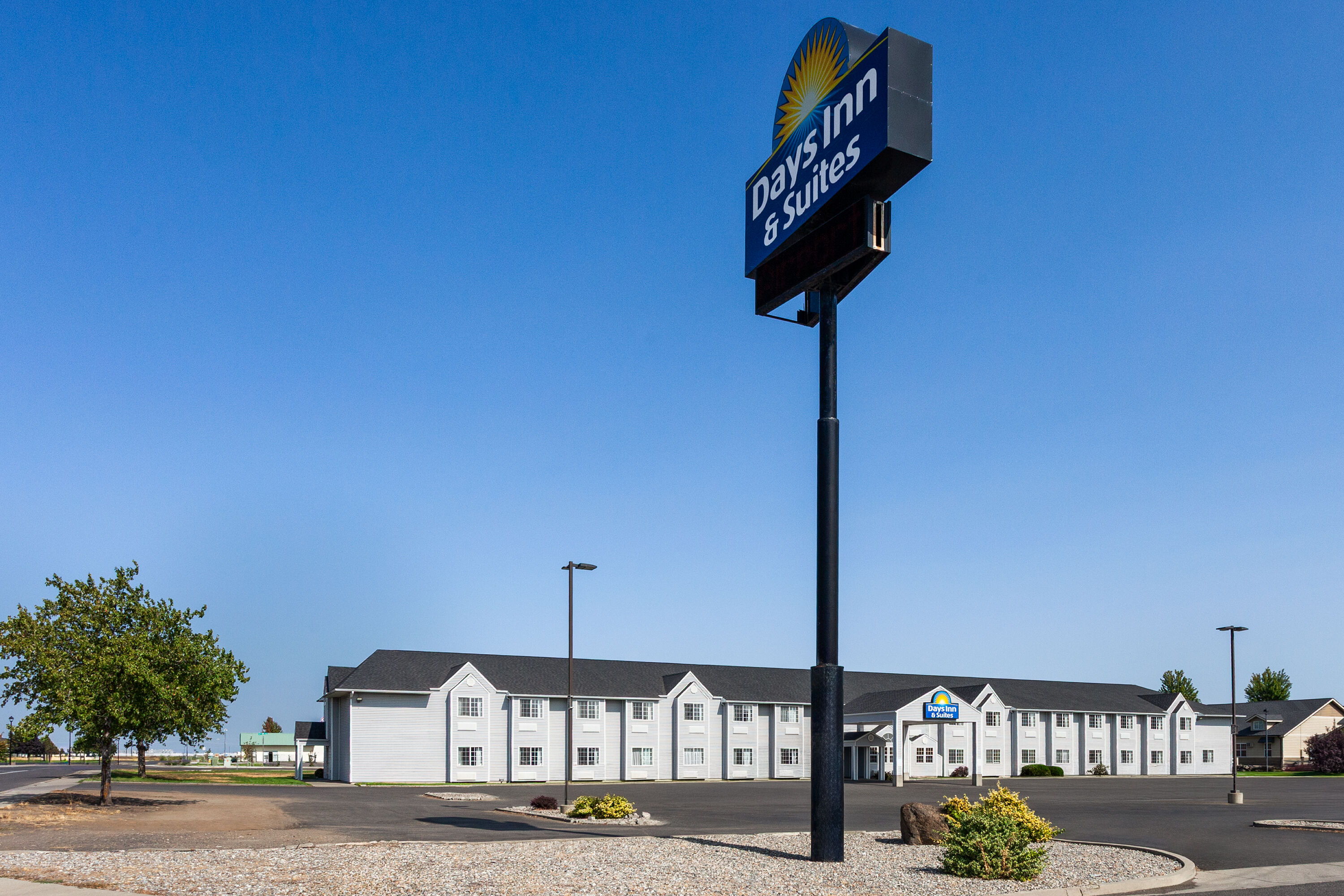 Exterior Day Image of Days Inn & Suites by Wyndham Spokane Airport Airway Heights hotel in Airway Heights, Washington