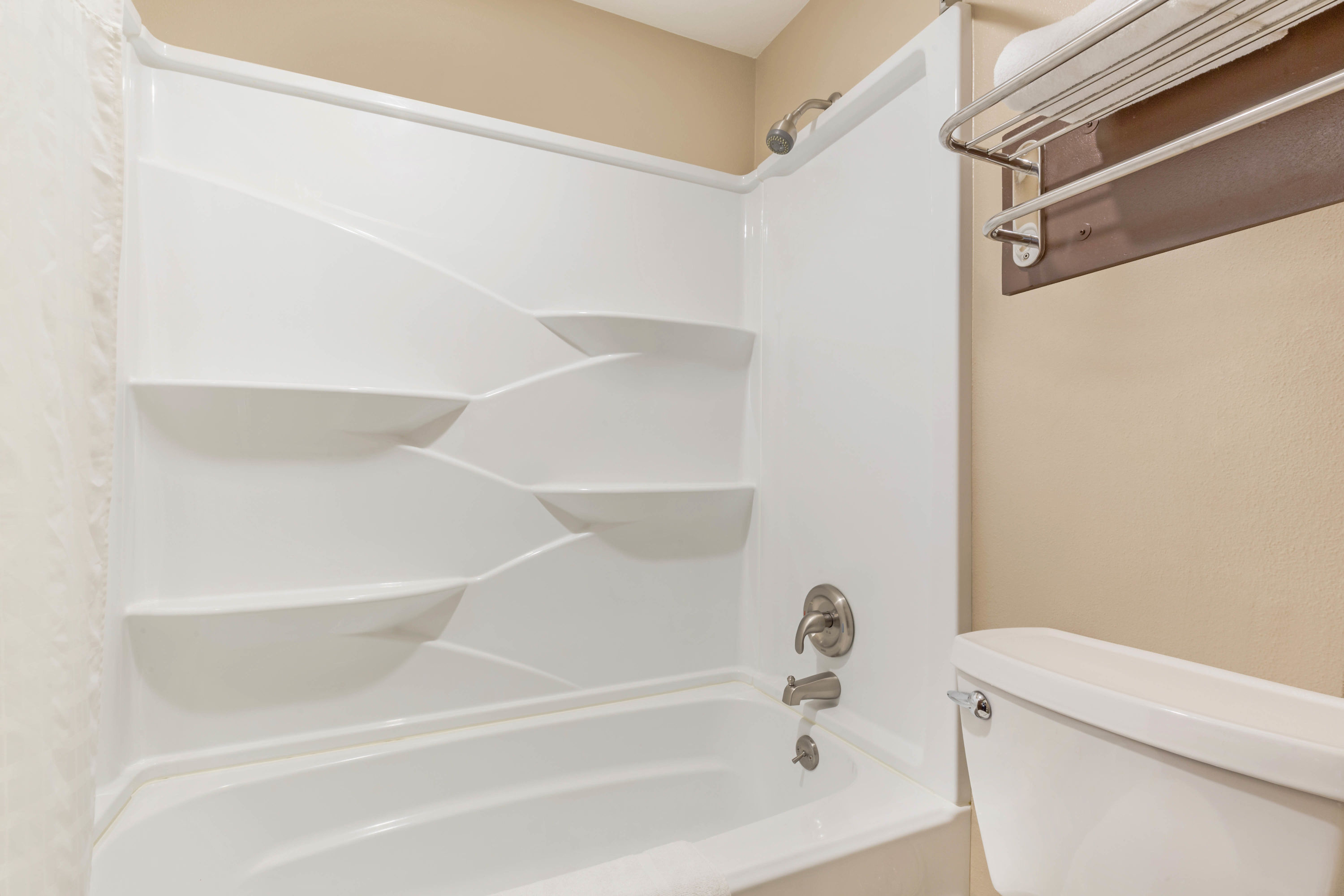 Guest room bath at the Days Inn by Wyndham Auburn in Auburn, Washington