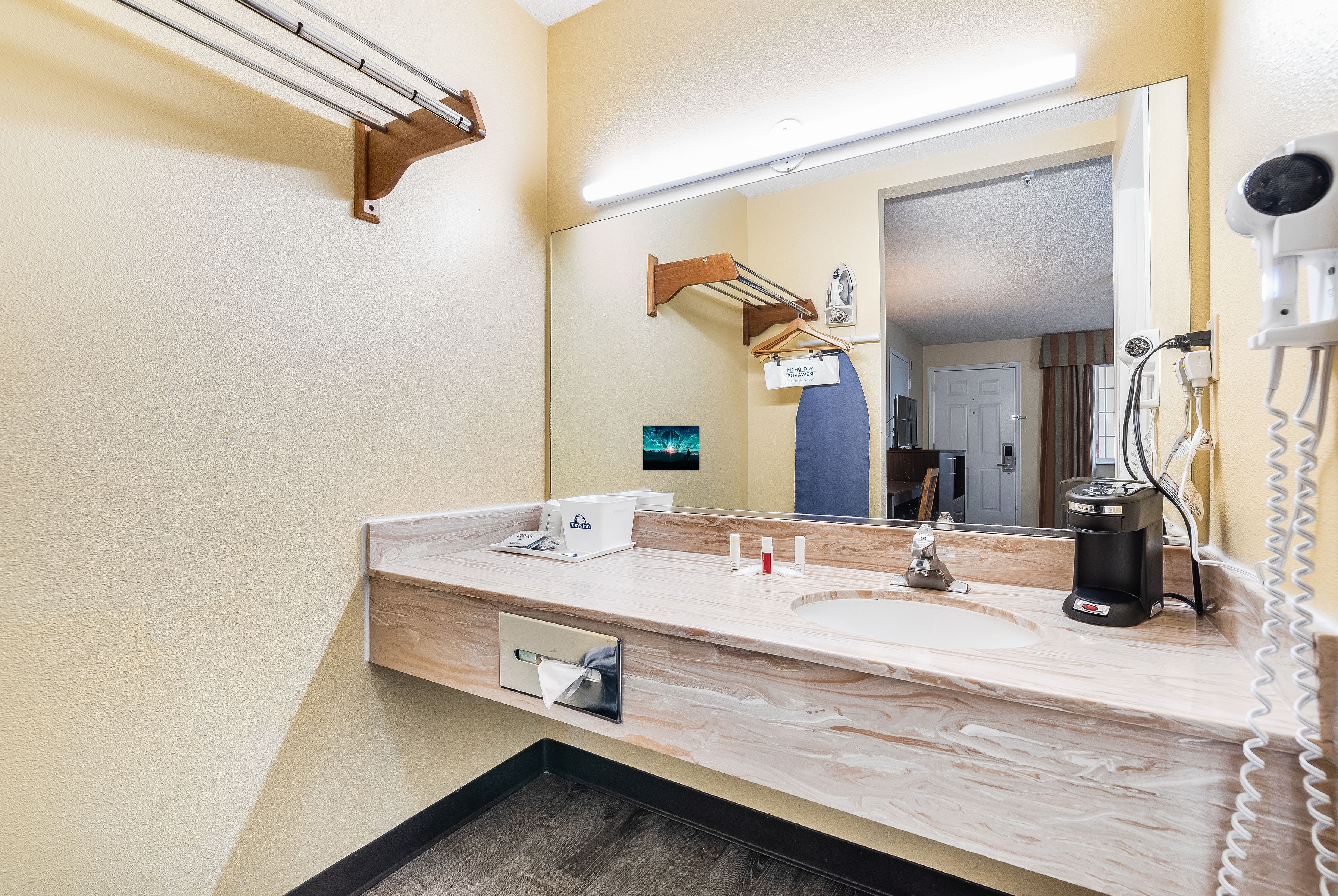 Guest room bath at the Days Inn by Wyndham Federal Way in Federal Way, Washington