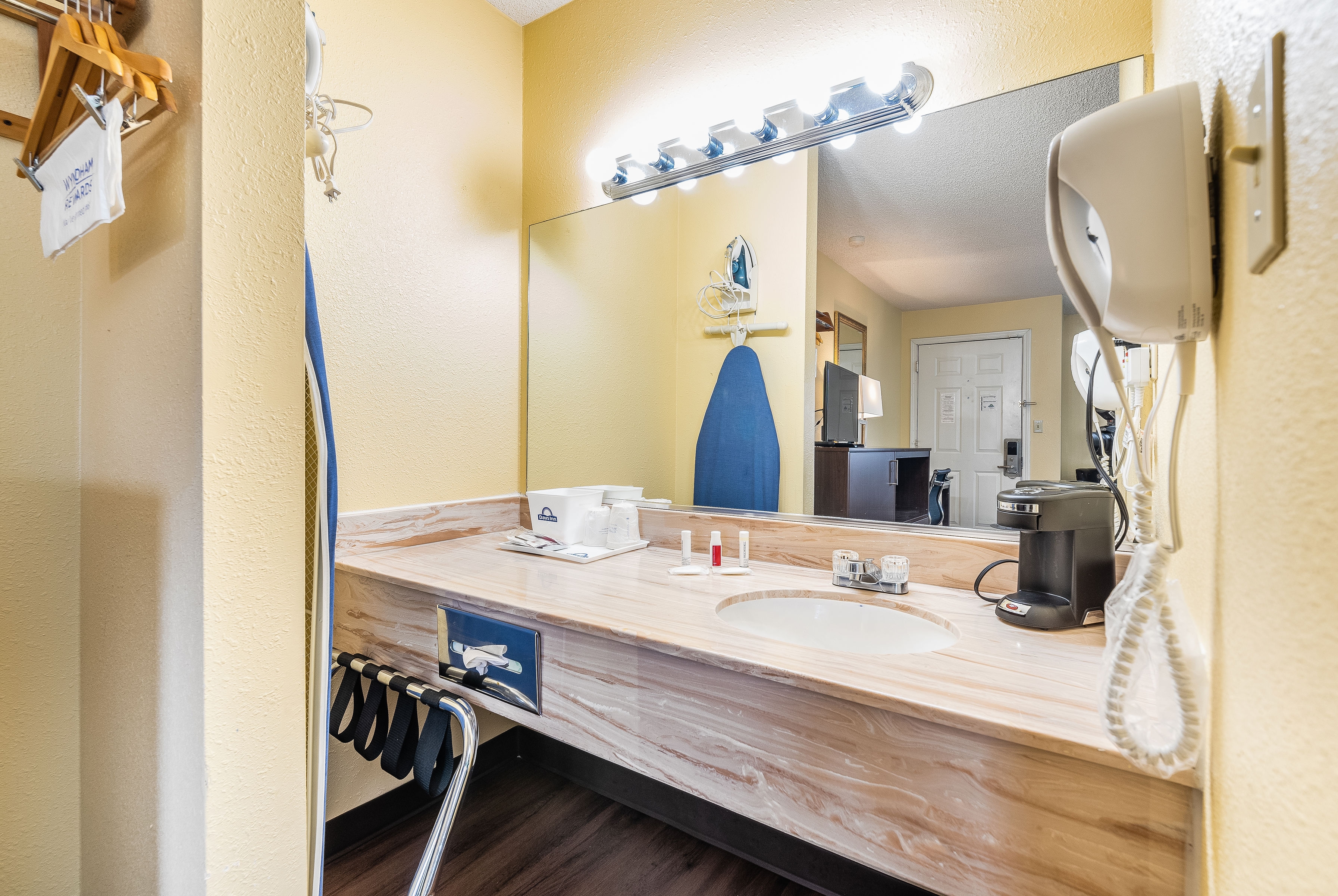 Guest room bath at the Days Inn by Wyndham Federal Way in Federal Way, Washington