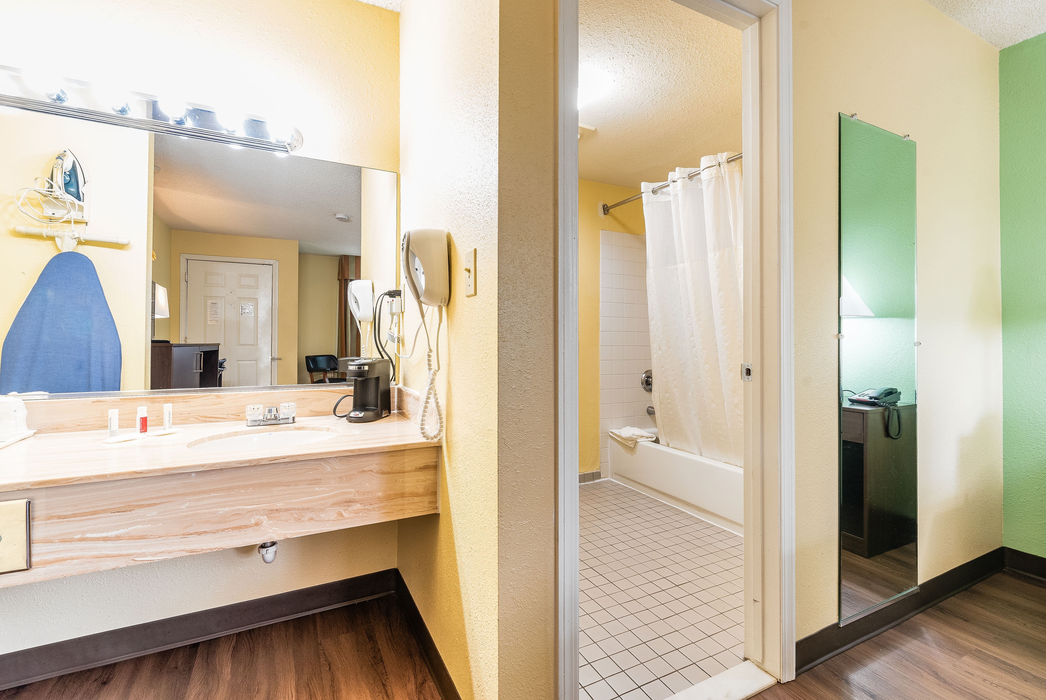 Guest room bath at the Days Inn by Wyndham Federal Way in Federal Way, Washington
