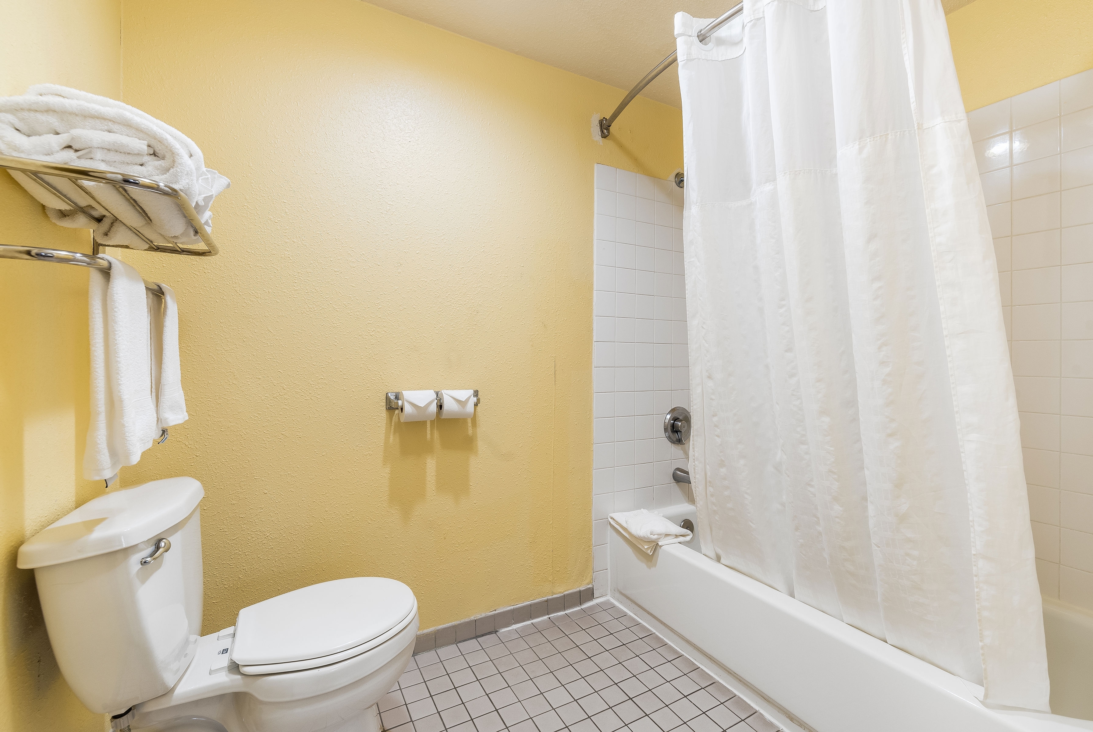 Guest room bath at the Days Inn by Wyndham Federal Way in Federal Way, Washington