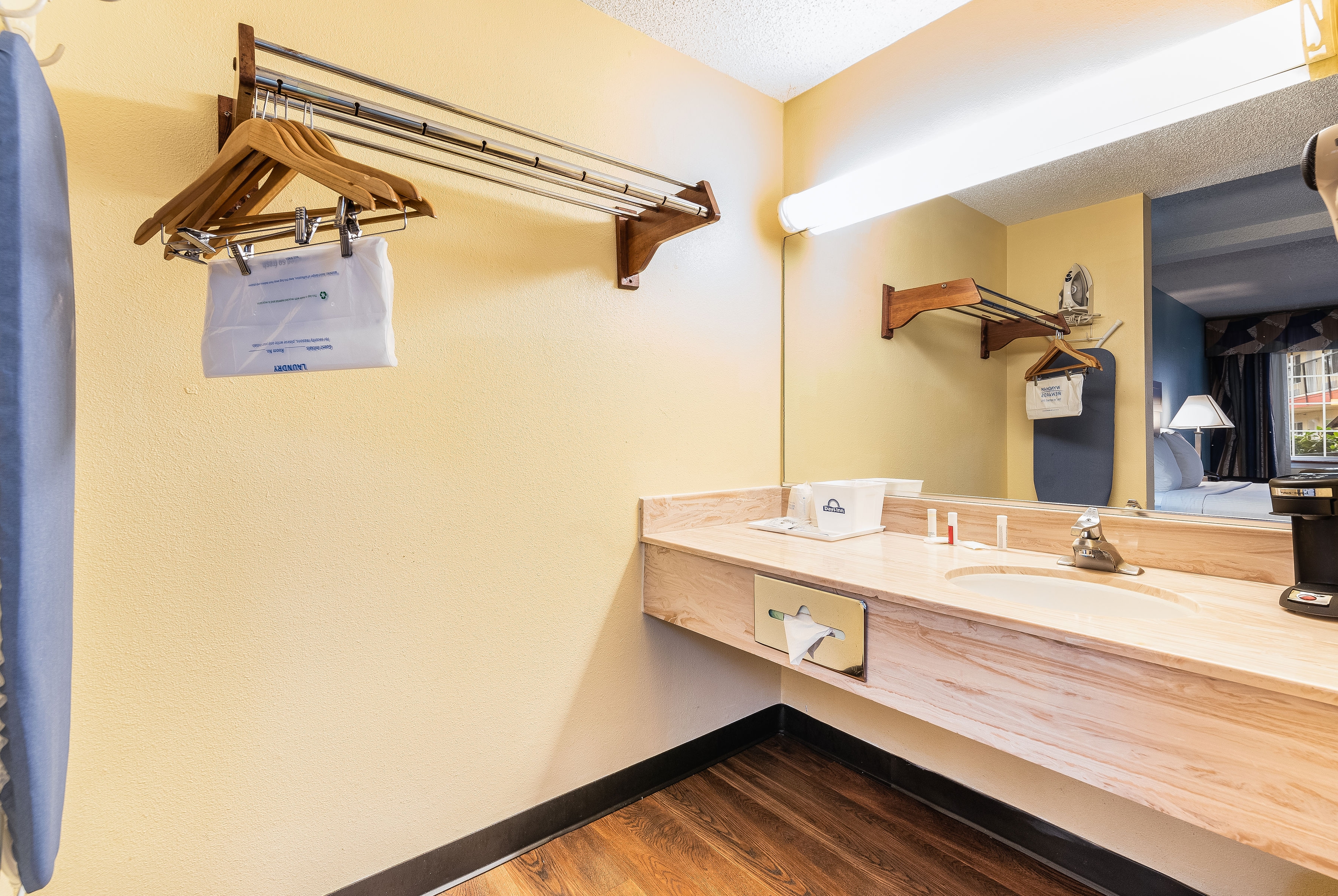 Guest room bath at the Days Inn by Wyndham Federal Way in Federal Way, Washington