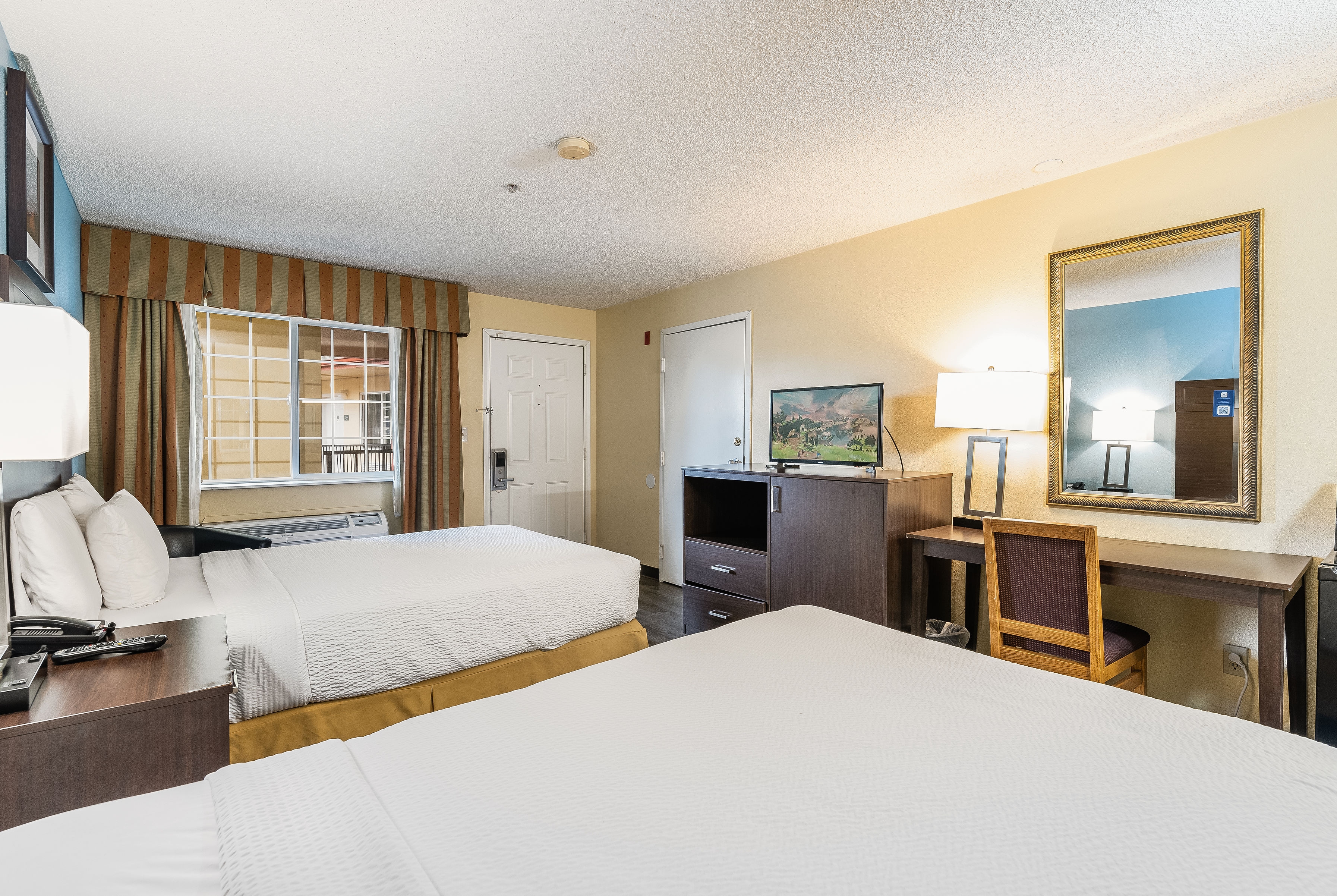 Guest room at the Days Inn by Wyndham Federal Way in Federal Way, Washington