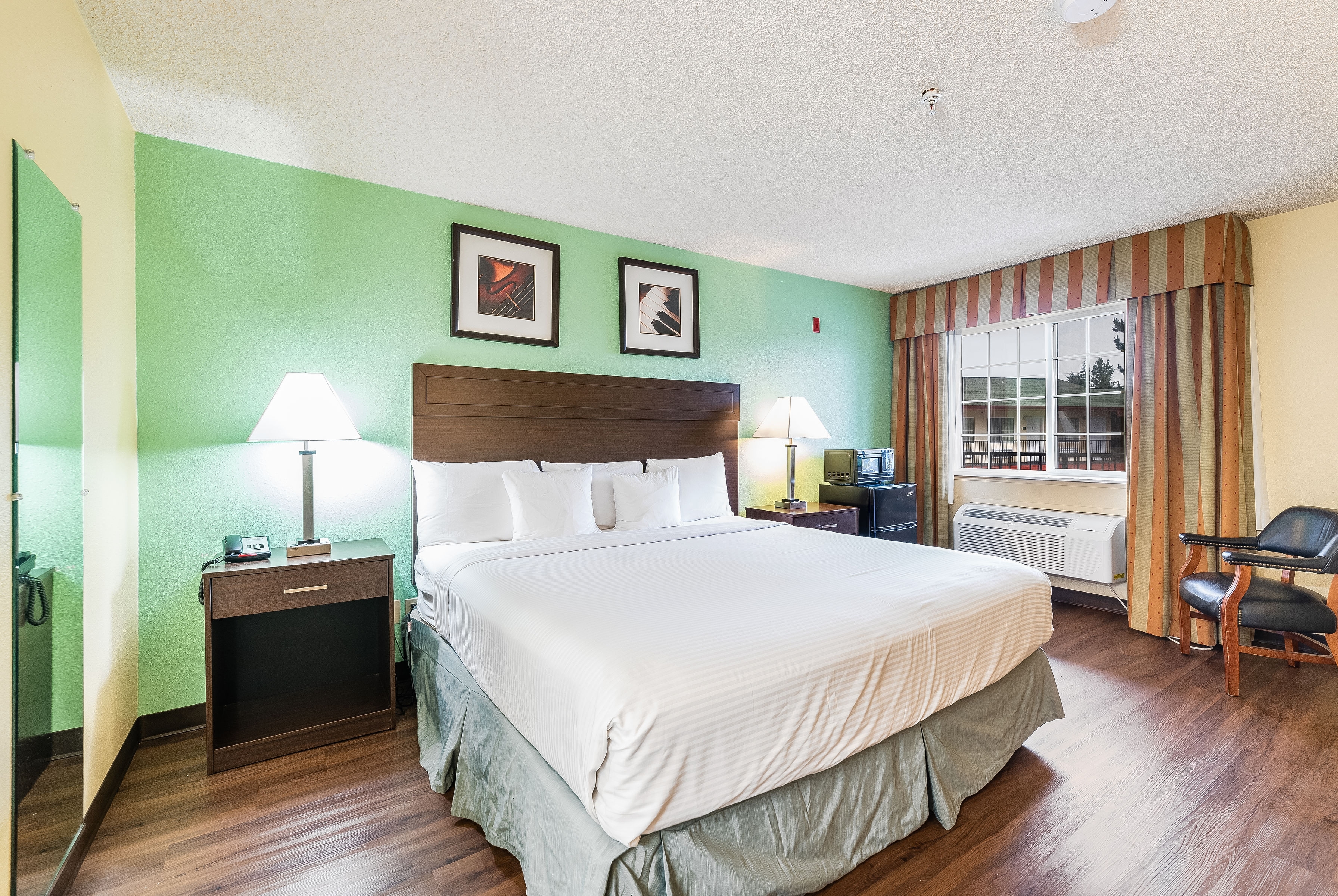 Guest room at the Days Inn by Wyndham Federal Way in Federal Way, Washington