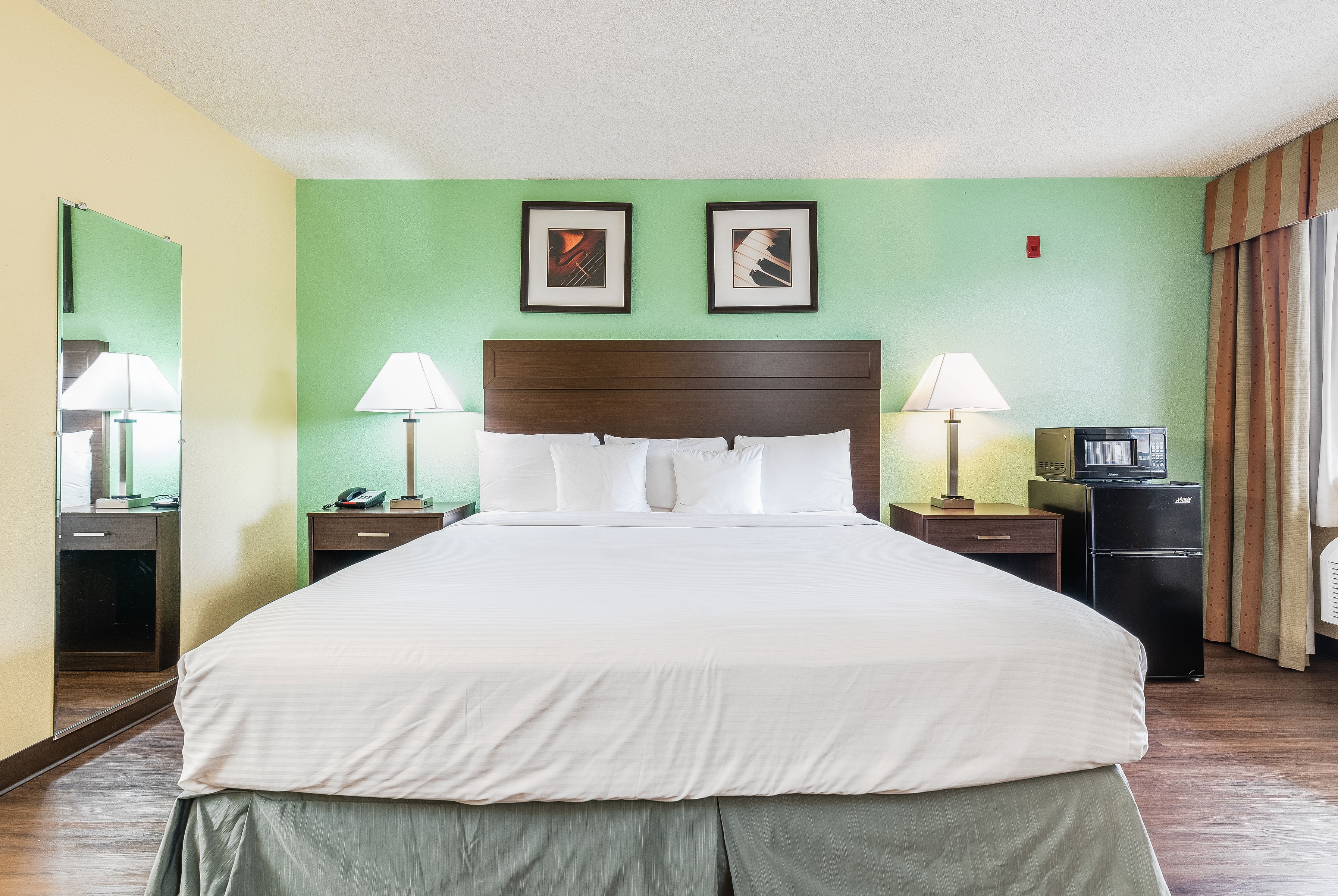 Guest room at the Days Inn by Wyndham Federal Way in Federal Way, Washington