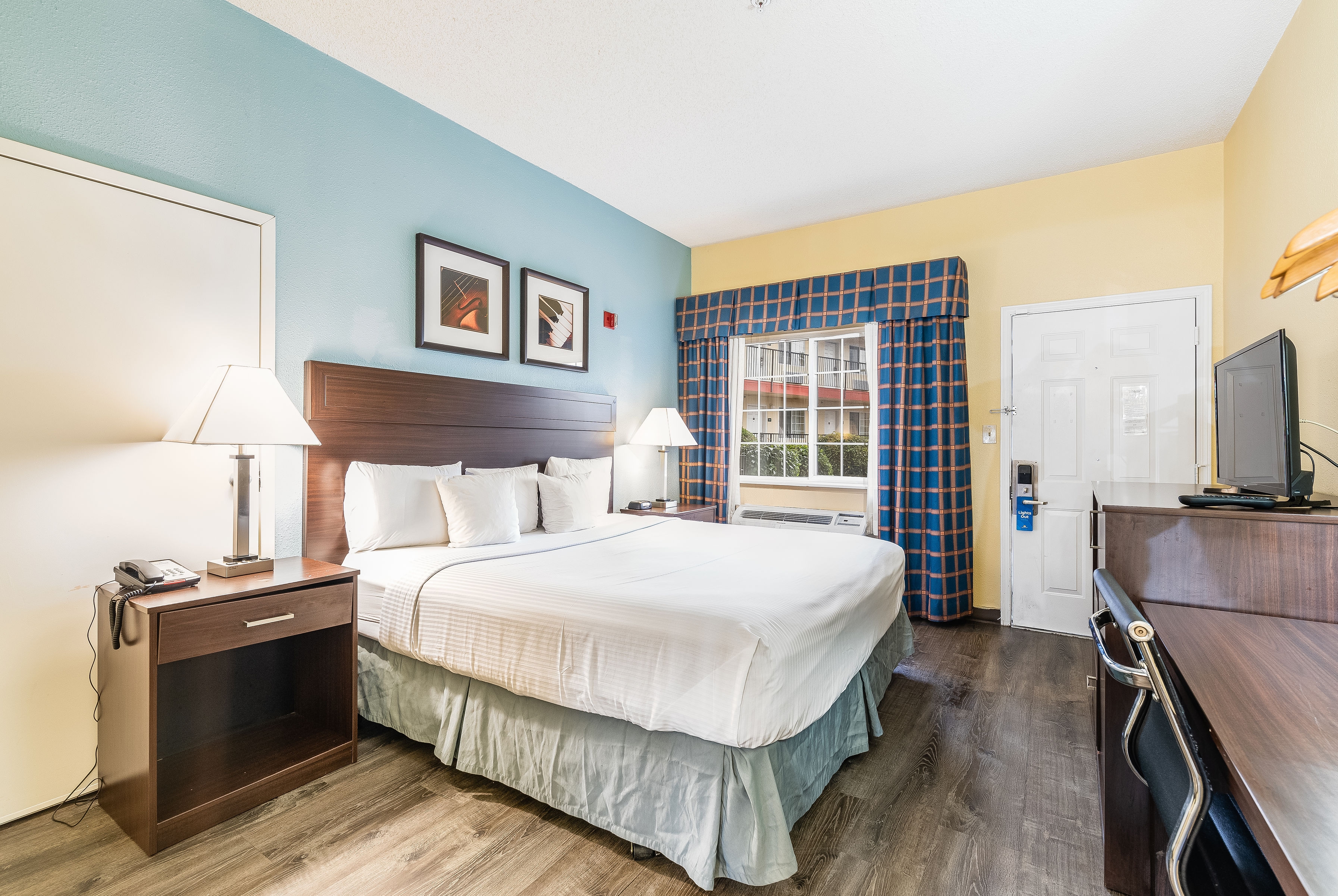 Guest room at the Days Inn by Wyndham Federal Way in Federal Way, Washington