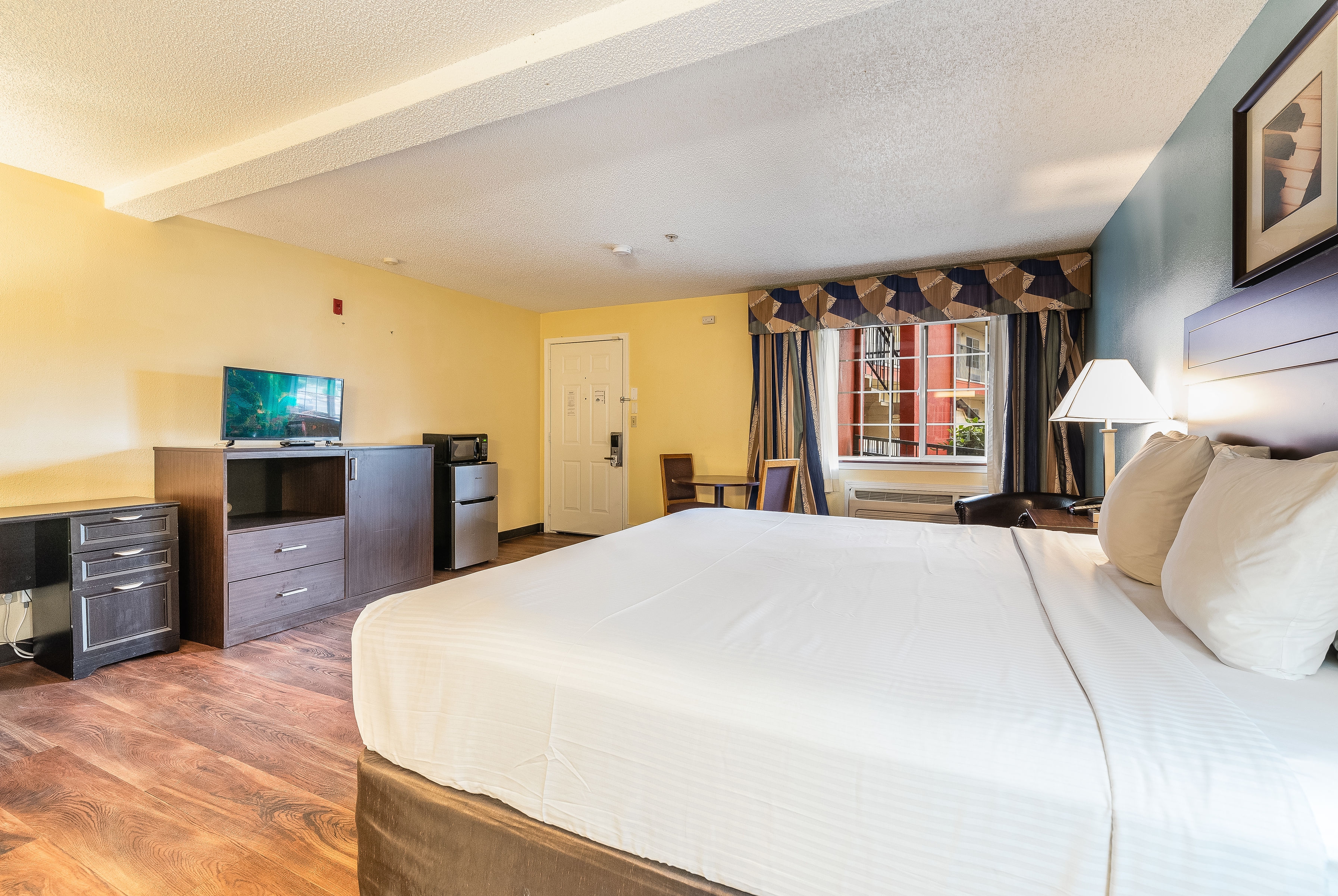Guest room at the Days Inn by Wyndham Federal Way in Federal Way, Washington