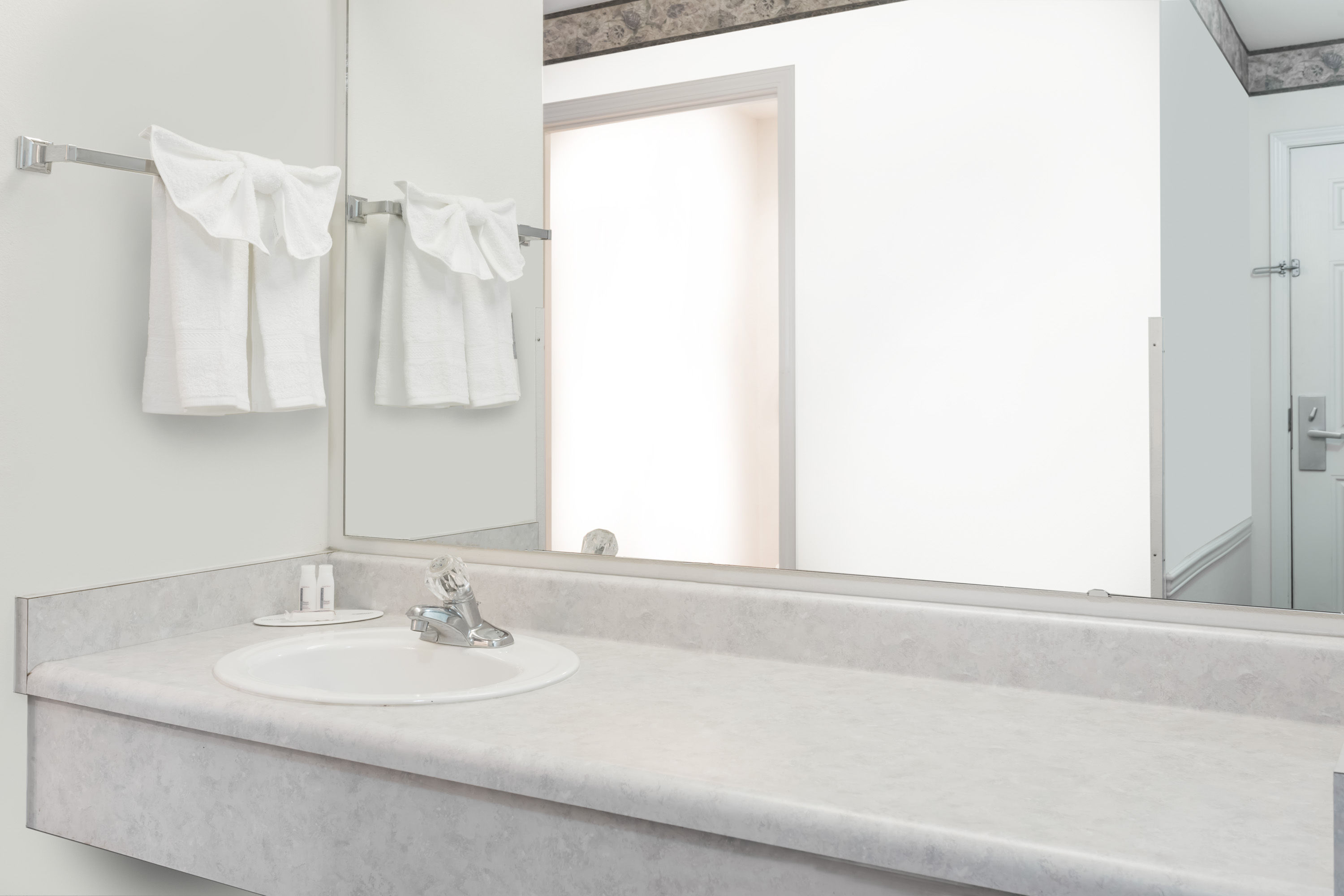 Guest room bath at the Days Inn by Wyndham Ocean Shores in Ocean Shores, Washington