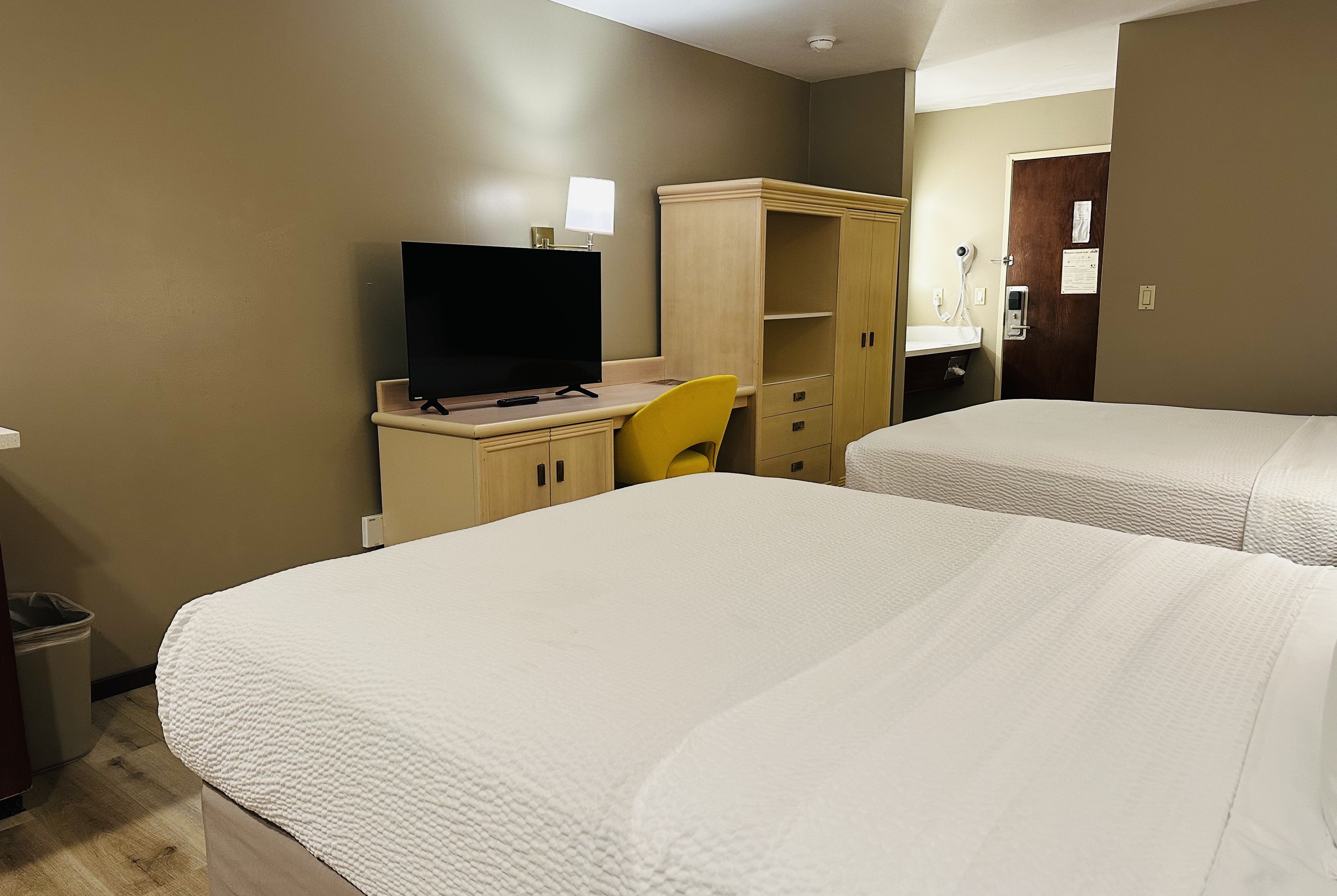 Guest room at the Days Inn by Wyndham Seatac Airport in Seattle, Washington