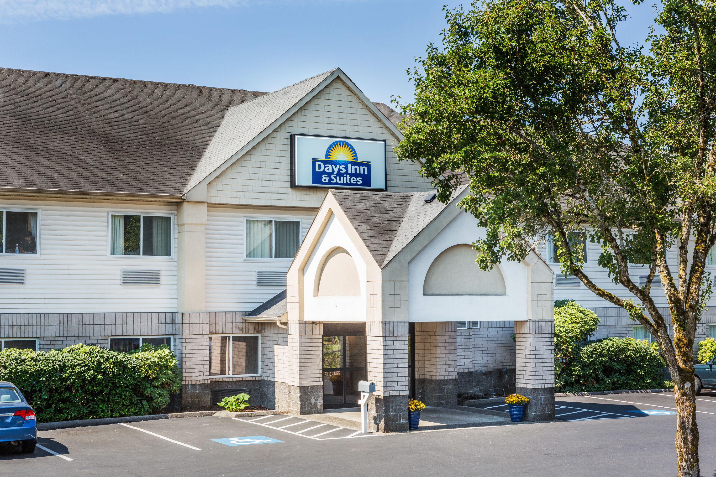 Exterior of Days Inn & Suites by Wyndham Vancouver hotel in Vancouver, Washington