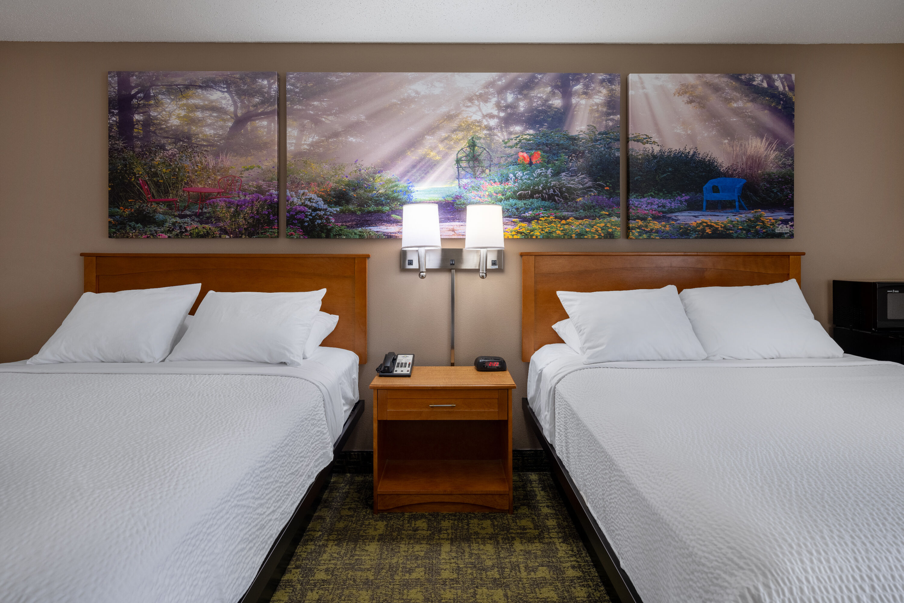 Guest room at the Days Inn & Suites by Wyndham Madison in Madison, Wisconsin